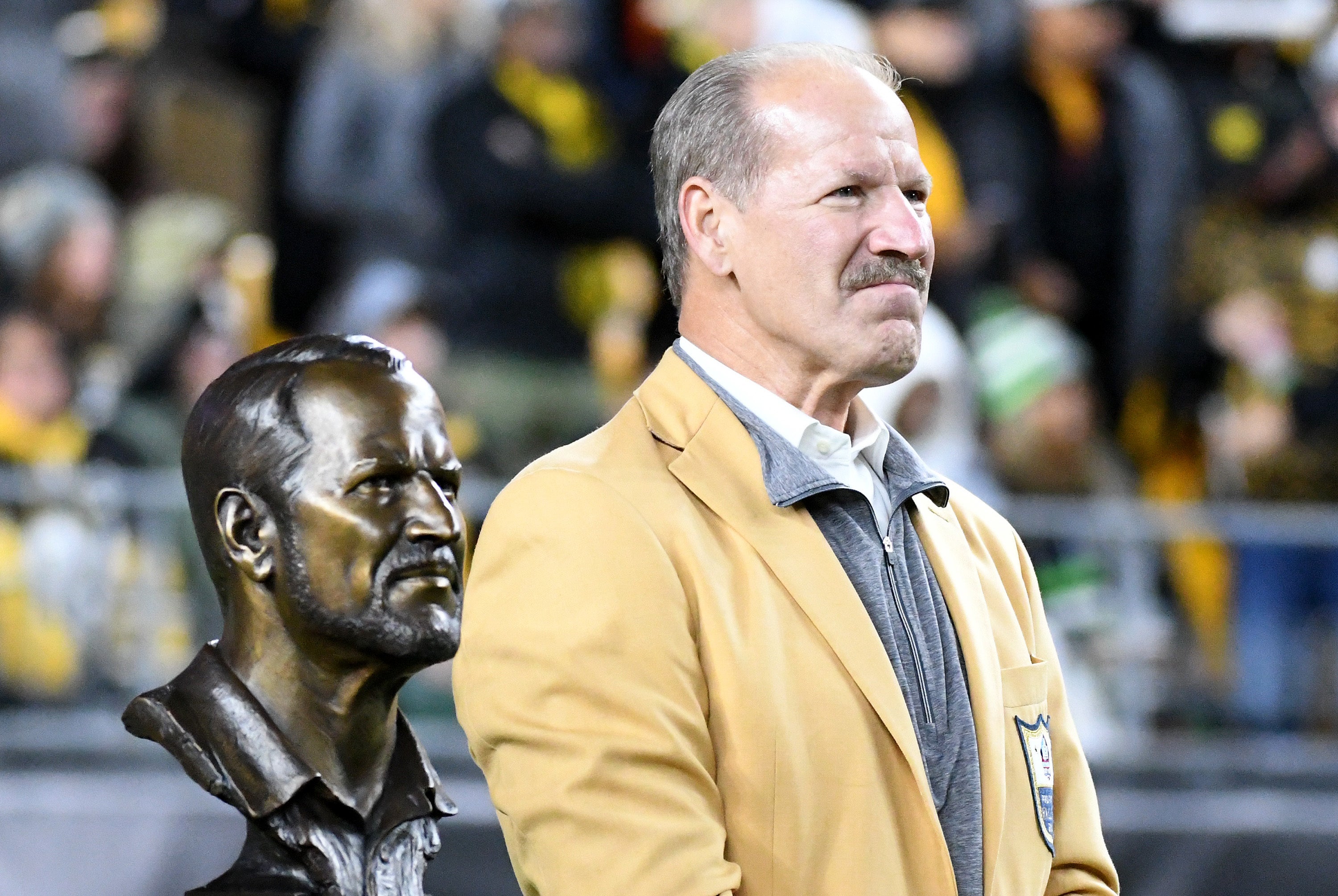 Oct 17, 2021; Pittsburgh, Pennsylvania, USA; Pittsburgh Steelers former head coach Bill Cowher stands beside his bust during halftime against the Seattle Seahawks at Heinz Field. Cowher was recognized for his induction into the Pro Football Hall of Fame. Mandatory Credit: Philip G. Pavely-USA TODAY Sports