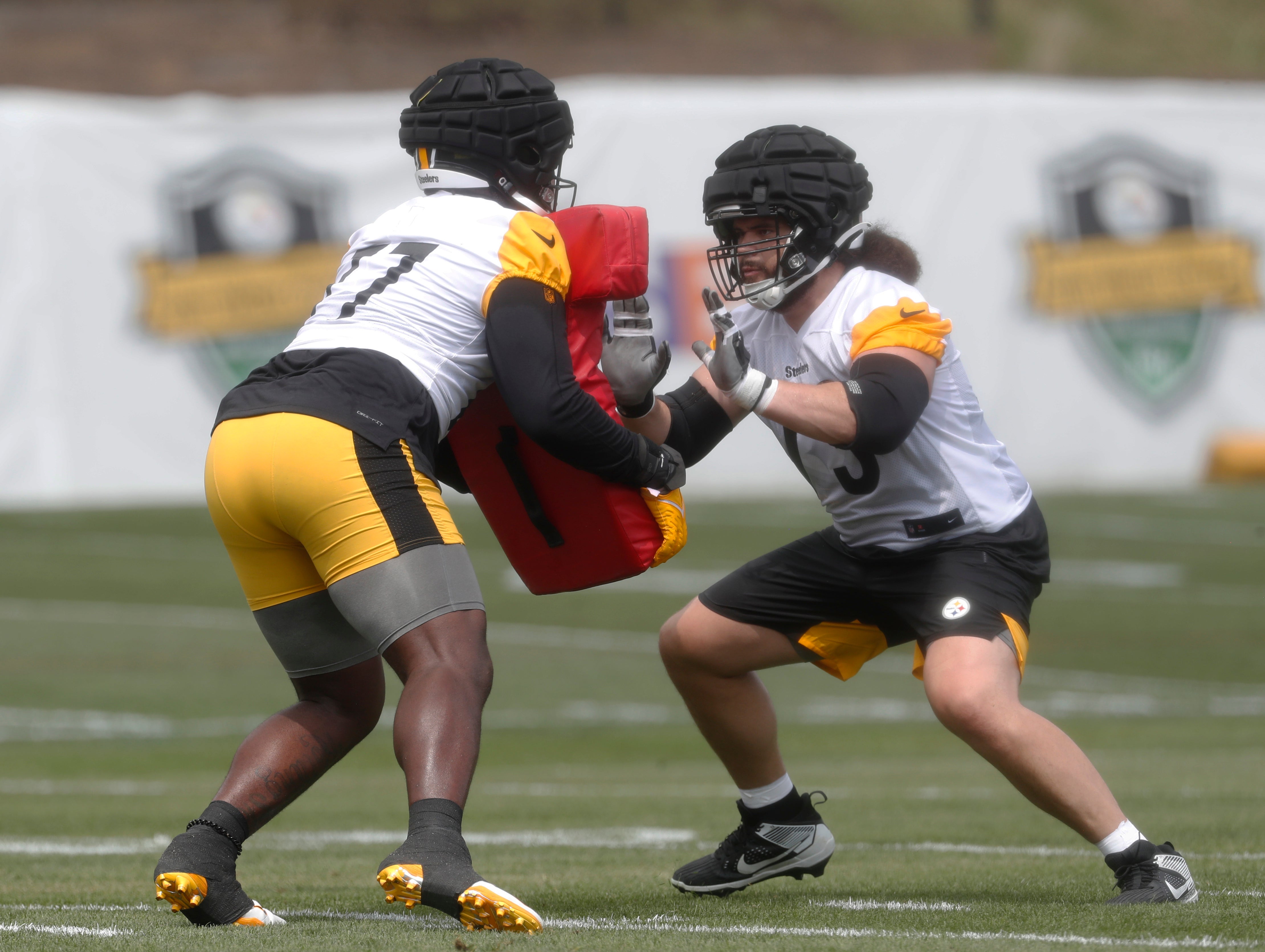 Jul 27, 2023; Latrobe, PA, USA; Pittsburgh Steelers guard Isaac Seumalo (73) works against offensive tackle Broderick Jones (77) in drills during training camp at Saint Vincent College. Mandatory Credit: Charles LeClaire-USA TODAY Sports