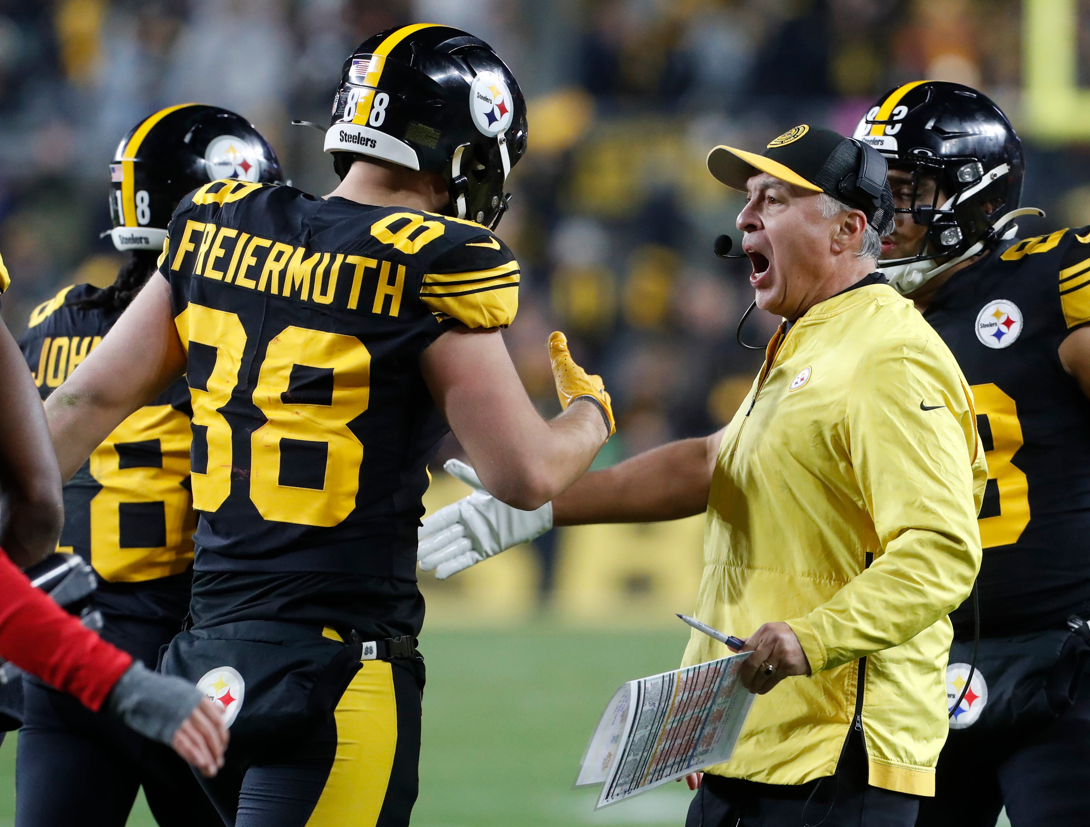 Dec 7, 2023; Pittsburgh, Pennsylvania, USA; Pittsburgh Steelers tight end Pat Freiermuth (88) celebrates his two point conversion with quarterbacks coach Mike Sullivan (right) against the New England Patriots during the fourth quarter at Acrisure Stadium. New England won 21-18. Mandatory Credit: Dec 7, 2023; Pittsburgh, Pennsylvania, USA; Pittsburgh Steelers tight end Pat Freiermuth (88) celebrates his two point conversion with quarterbacks coach Mike Sullivan (right) against the New England Patriots during the fourth quarter at Acrisure Stadium. New England won 21-18. Mandatory Credit: Charles LeClaire-USA TODAY Sports