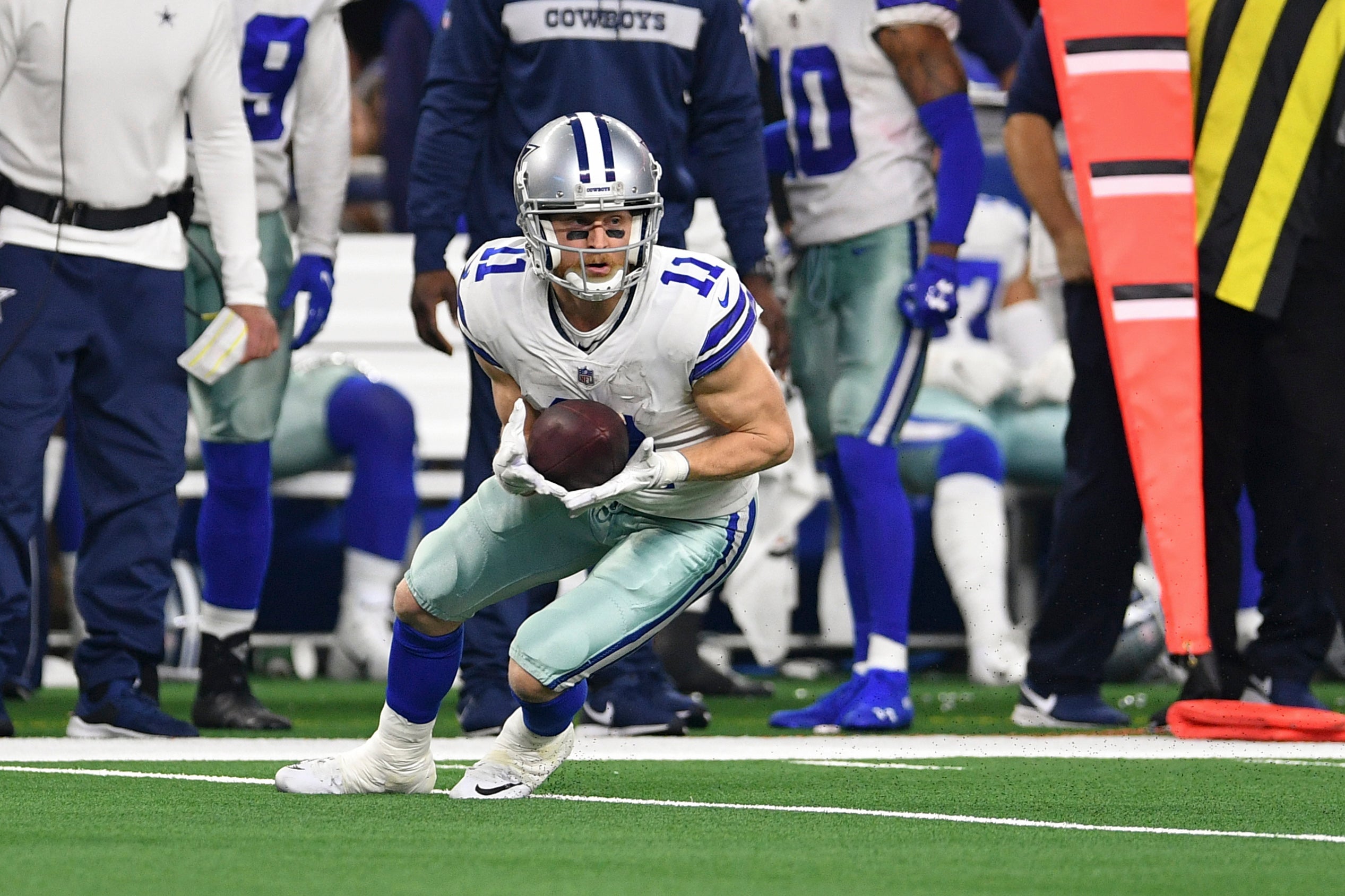 Dallas Cowboys wide receiver Cole Beasley (11) catches a pass against the Seattle Seahawks in the second half in a NFC Wild Card playoff football game at AT&T Stadium.
