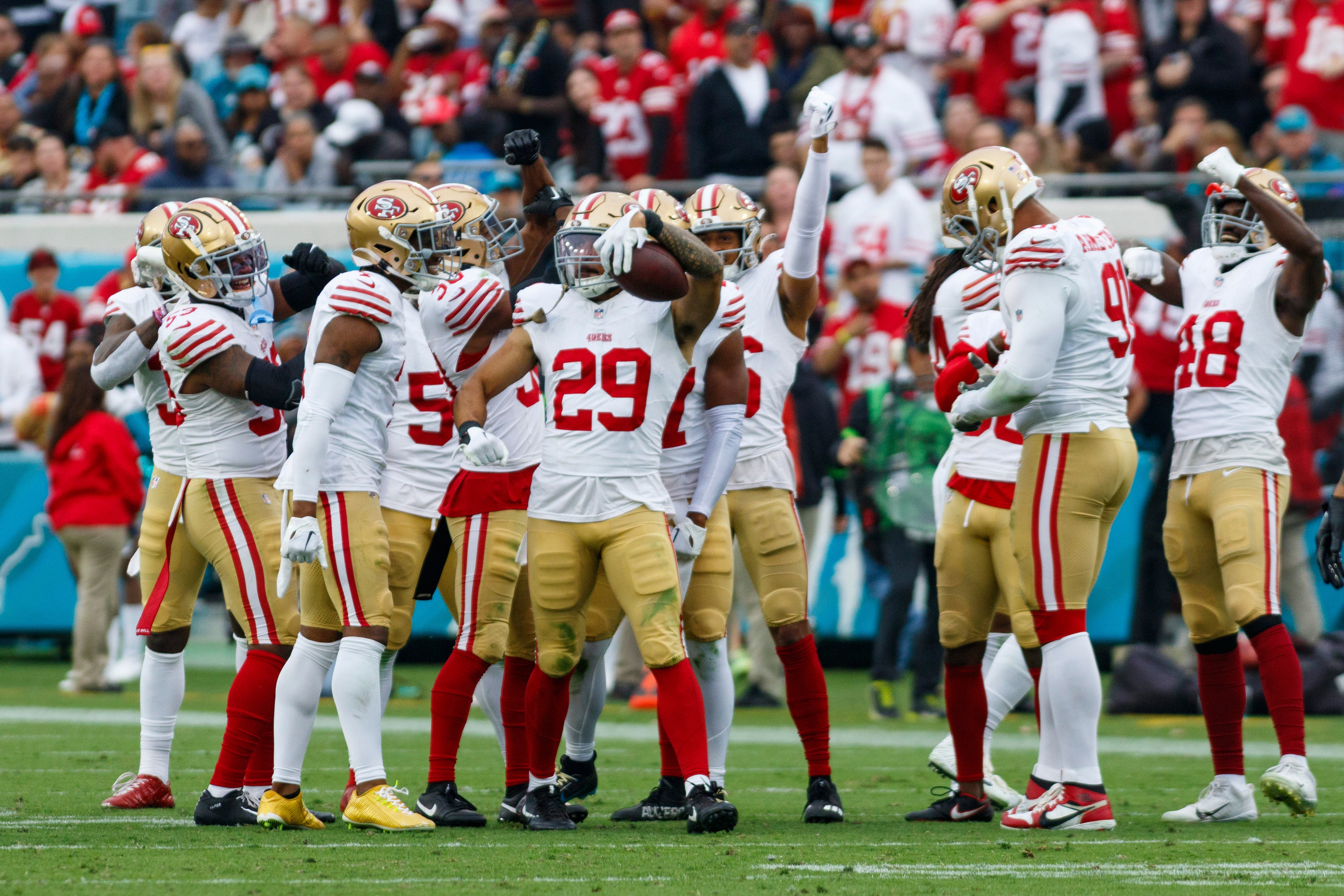 Nov 12, 2023; Jacksonville, Florida, USA; San Francisco 49ers safety Talanoa Hufanga (29) and teammates celebrate a fumble recovery during the third quarter at EverBank Stadium.