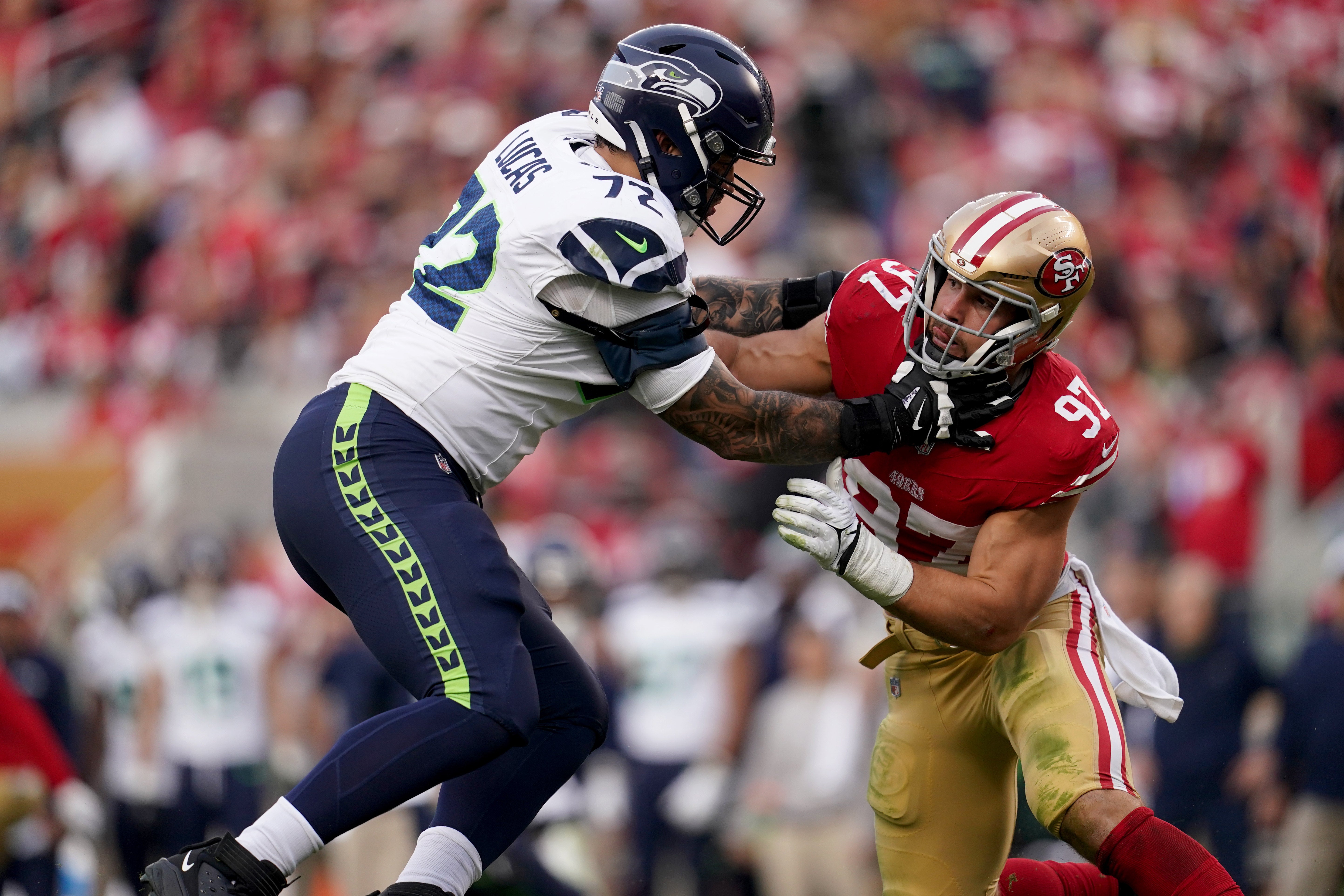 Dec 10, 2023; Santa Clara, California, USA; Seattle Seahawks offensive tackle Abraham Lucas (72) blocks San Francisco 49ers defensive end Nick Bosa (97) in the fourth quarter at Levi's Stadium.