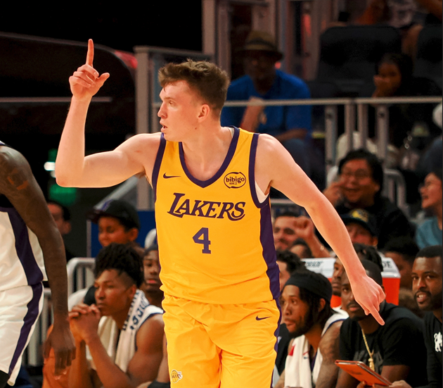 Jul 6, 2024; San Francisco, CA, USA; Los Angeles Lakers guard Dalton Knecht (4) gestures after scoring a three point basket against the Sacramento Kings during the second quarter at Chase Center.