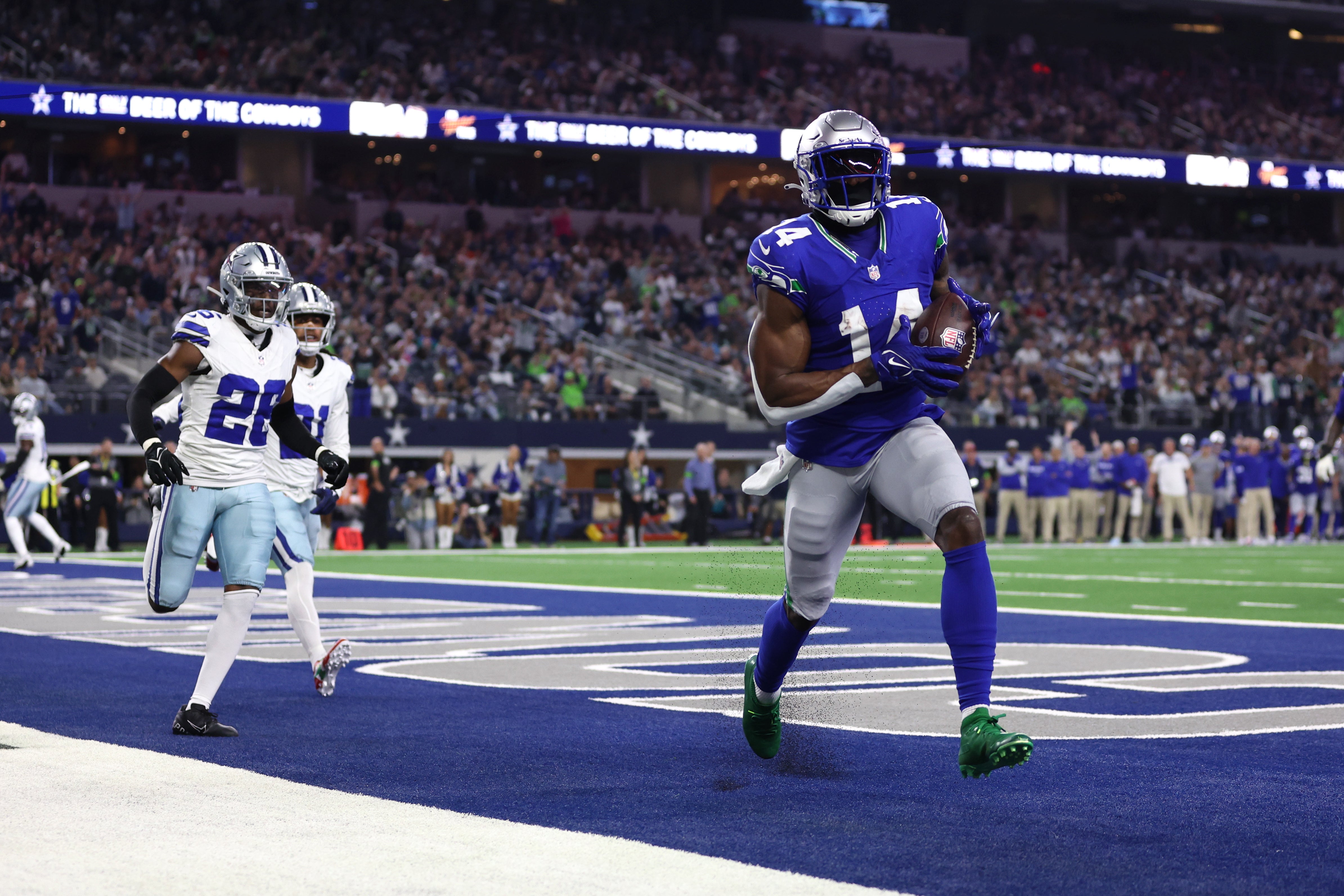 Nov 30, 2023; Arlington, Texas, USA; Seattle Seahawks wide receiver DK Metcalf (14) catches a pass for a touchdown during the second half against the Dallas Cowboys at AT&T Stadium.