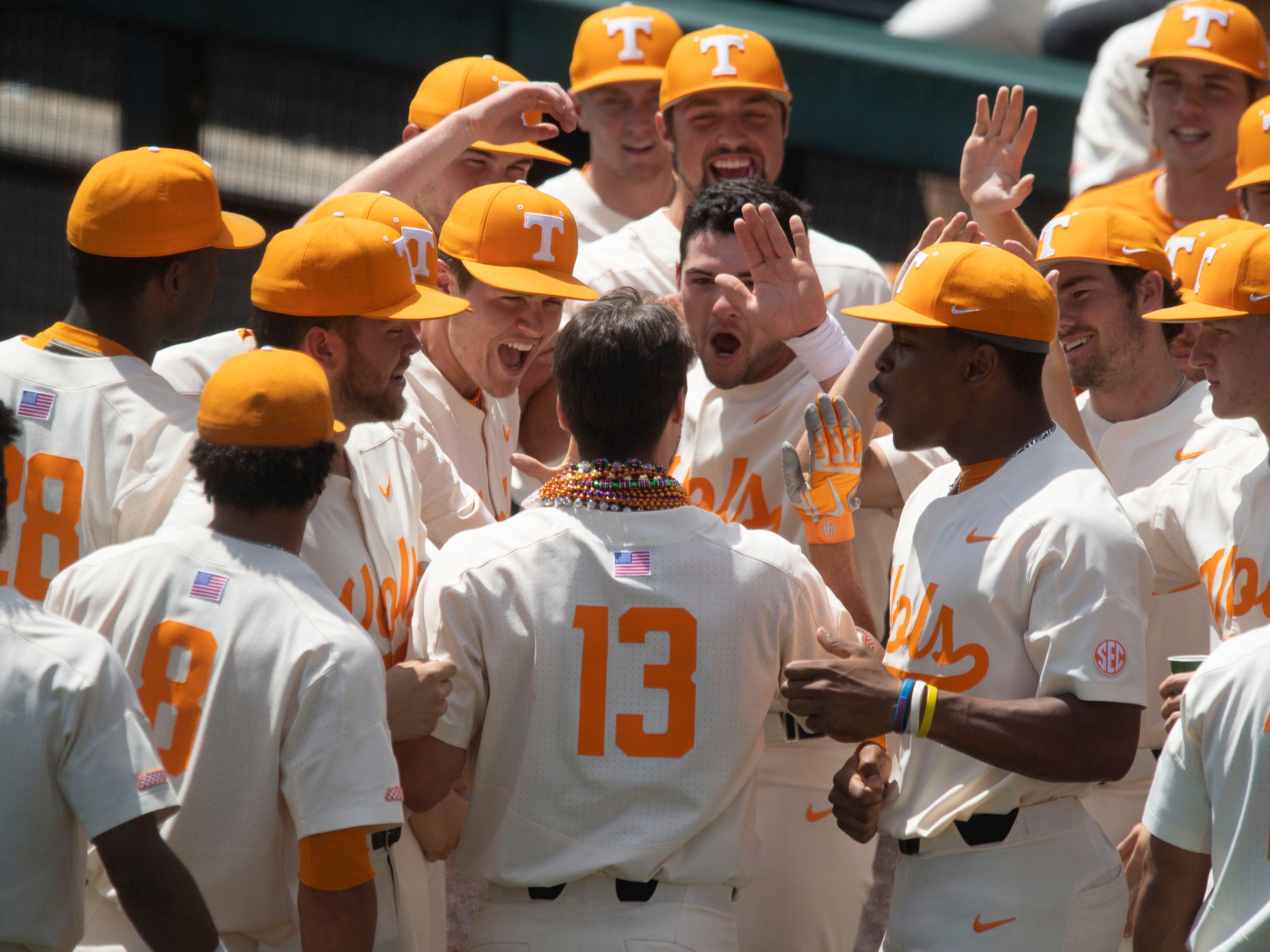 Tennessee's Andre Lipcius (13) is congratulated by teammates after hitting three-run homer against Missouri at Lindsey Nelson Stadium on Sunday, May 5, 2019.