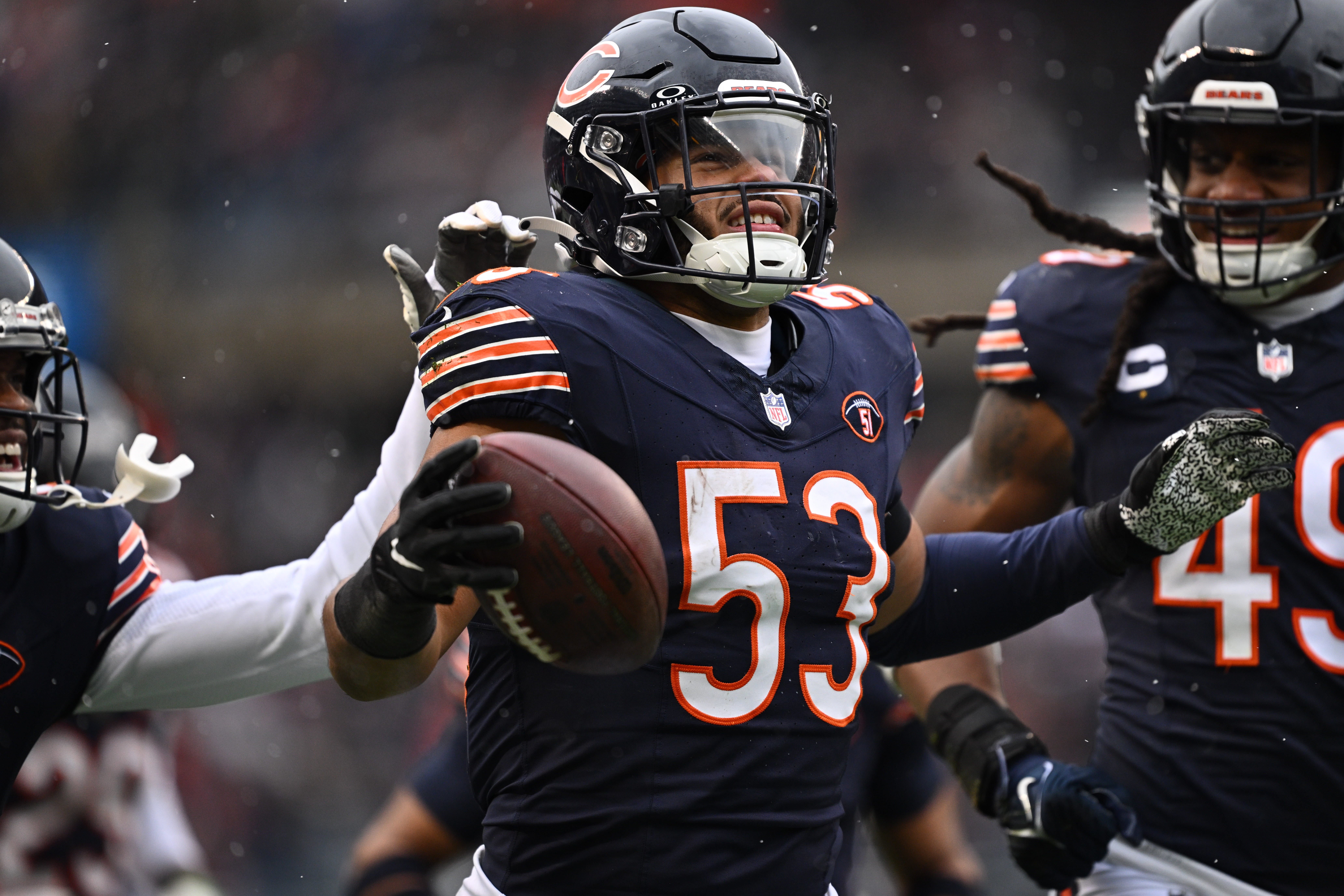 Dec 31, 2023; Chicago, Illinois, USA; Chicago Bears linebacker T.J. Edwards (53) celebrates after intercepting an Atlanta Falcons pass in the first half at Soldier Field.