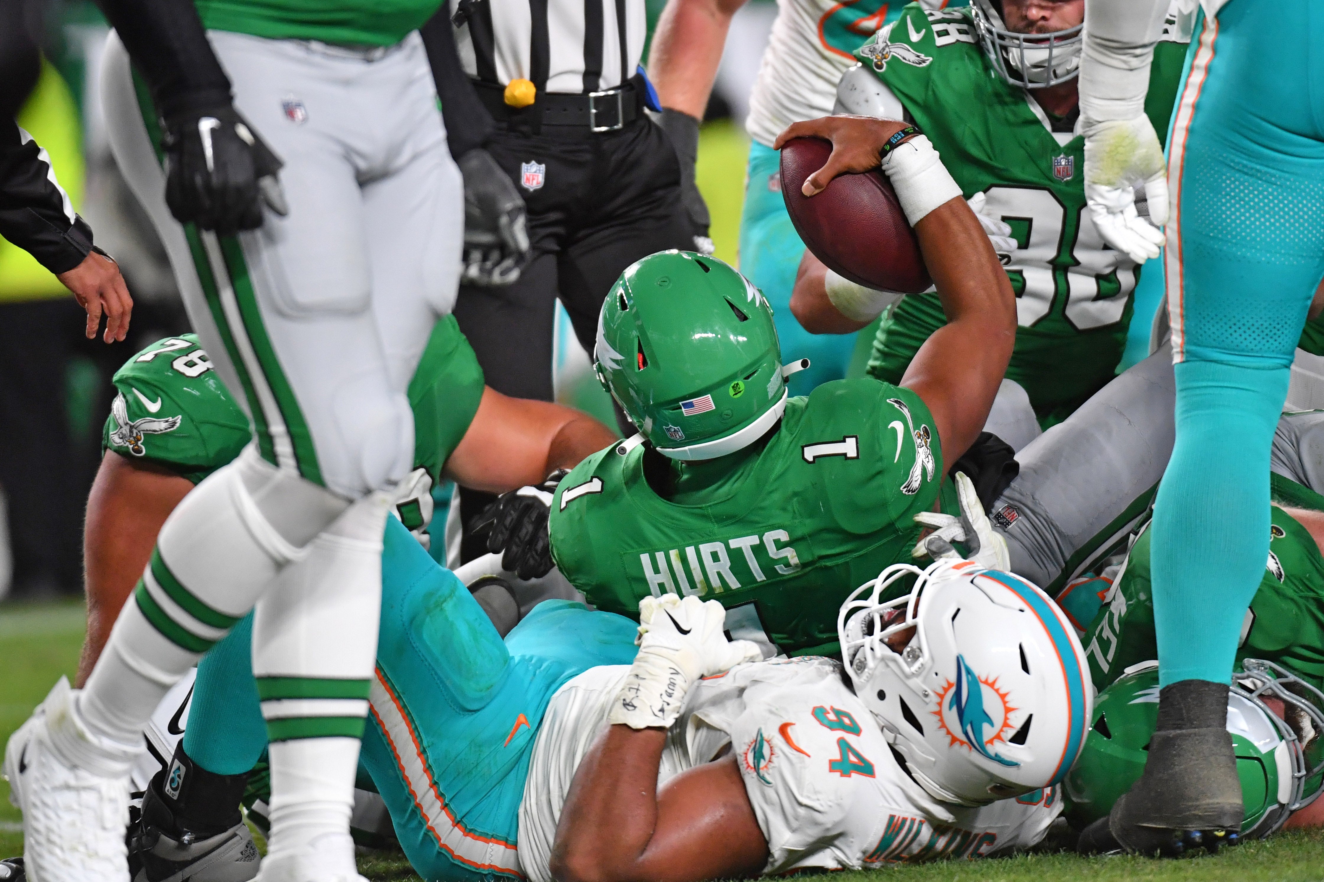 Philadelphia Eagles quarterback Jalen Hurts (1) scores on a one yard touchdown run against the Miami Dolphins during the second quarter at Lincoln Financial Field.