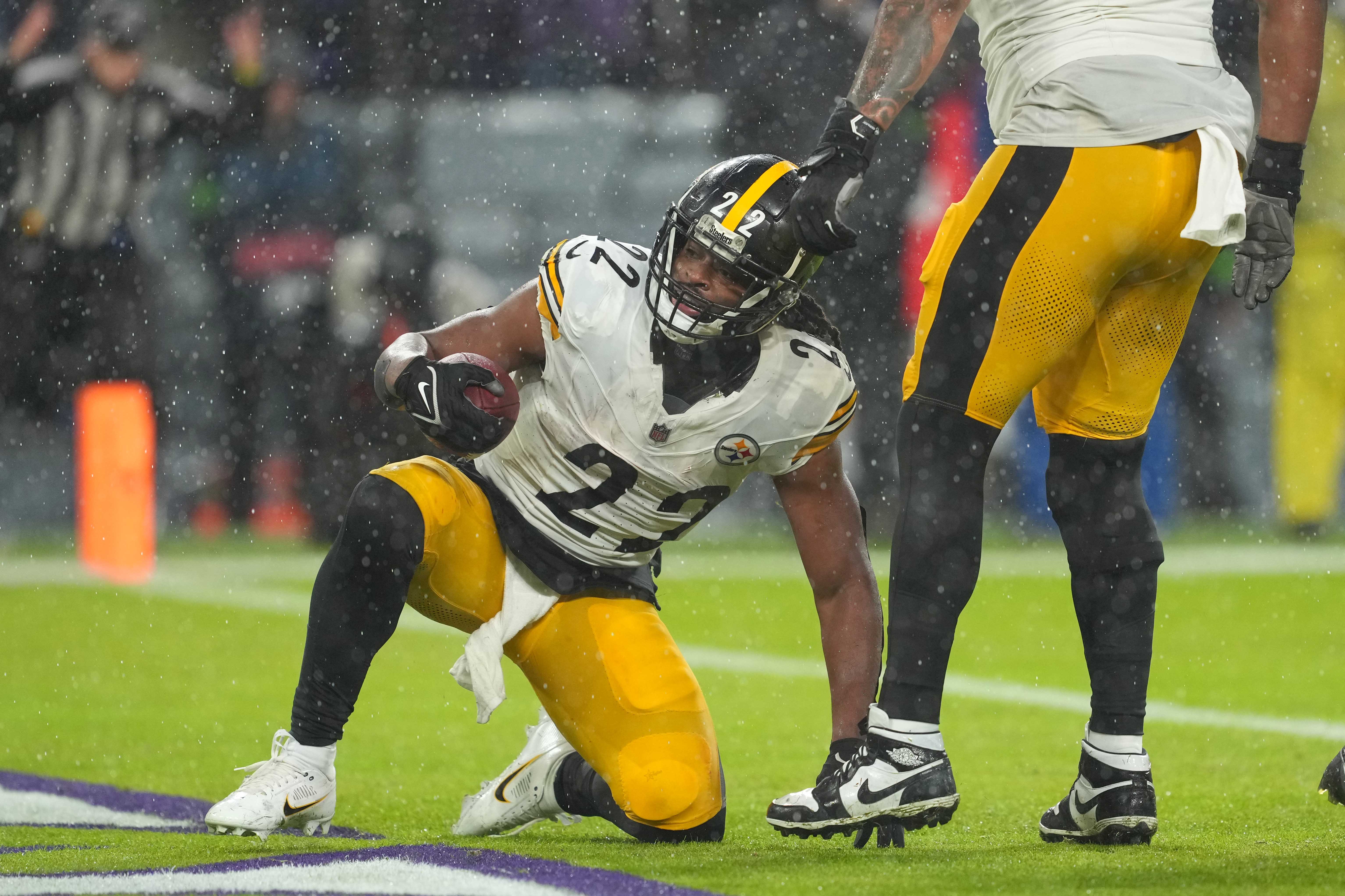 Jan 6, 2024; Baltimore, Maryland, USA; Pittsburgh Steelers running back Najee Harris (23) scores a first quarter touchdown against the Baltimore Ravens at M&T Bank Stadium. Mandatory Credit: Mitch Stringer-USA TODAY Sports  