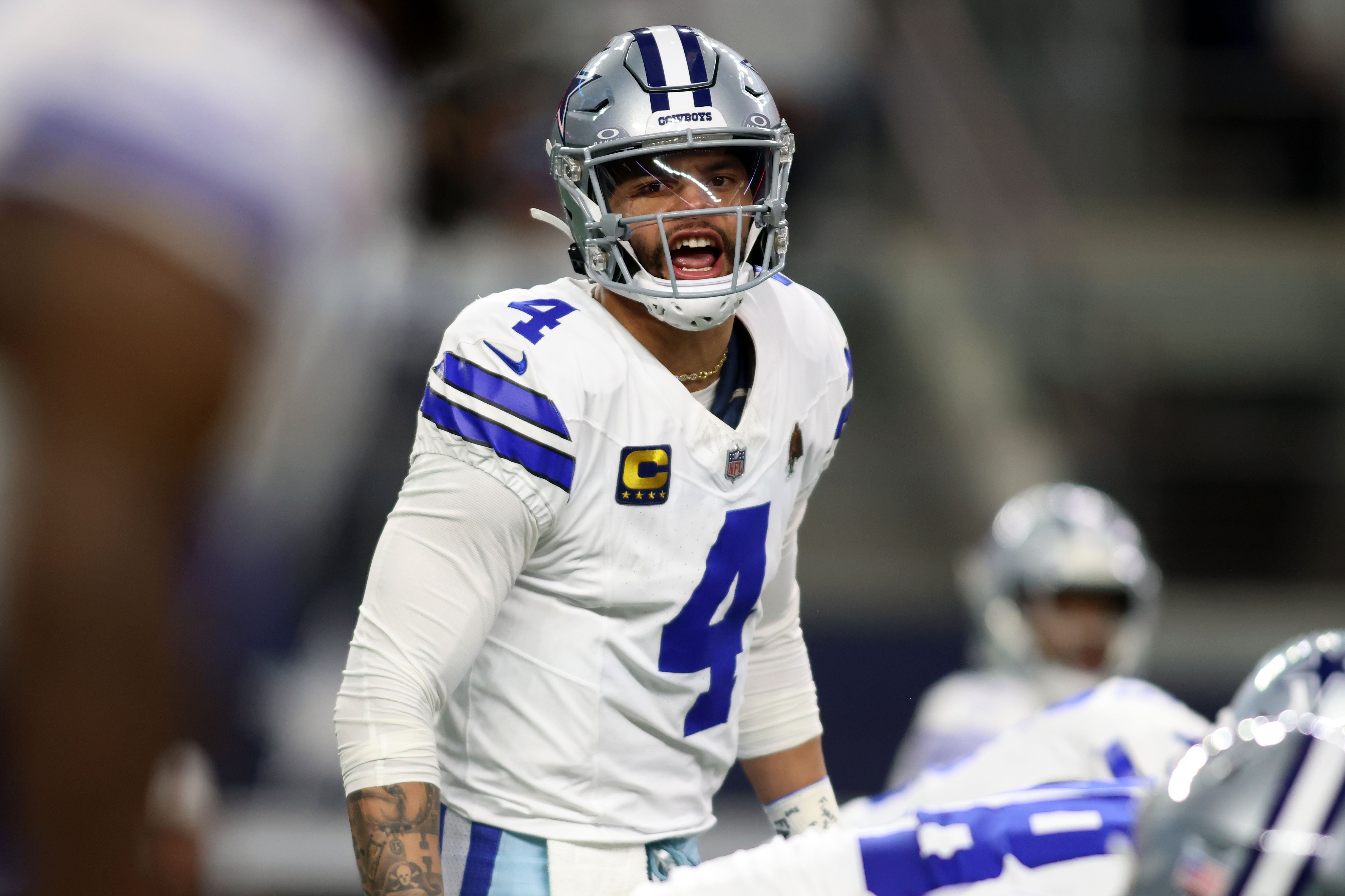 Dallas Cowboys quarterback Dak Prescott (4) reacts during the first half against the Green Bay Packers for the 2024 NFC wild card game at AT&T Stadium.