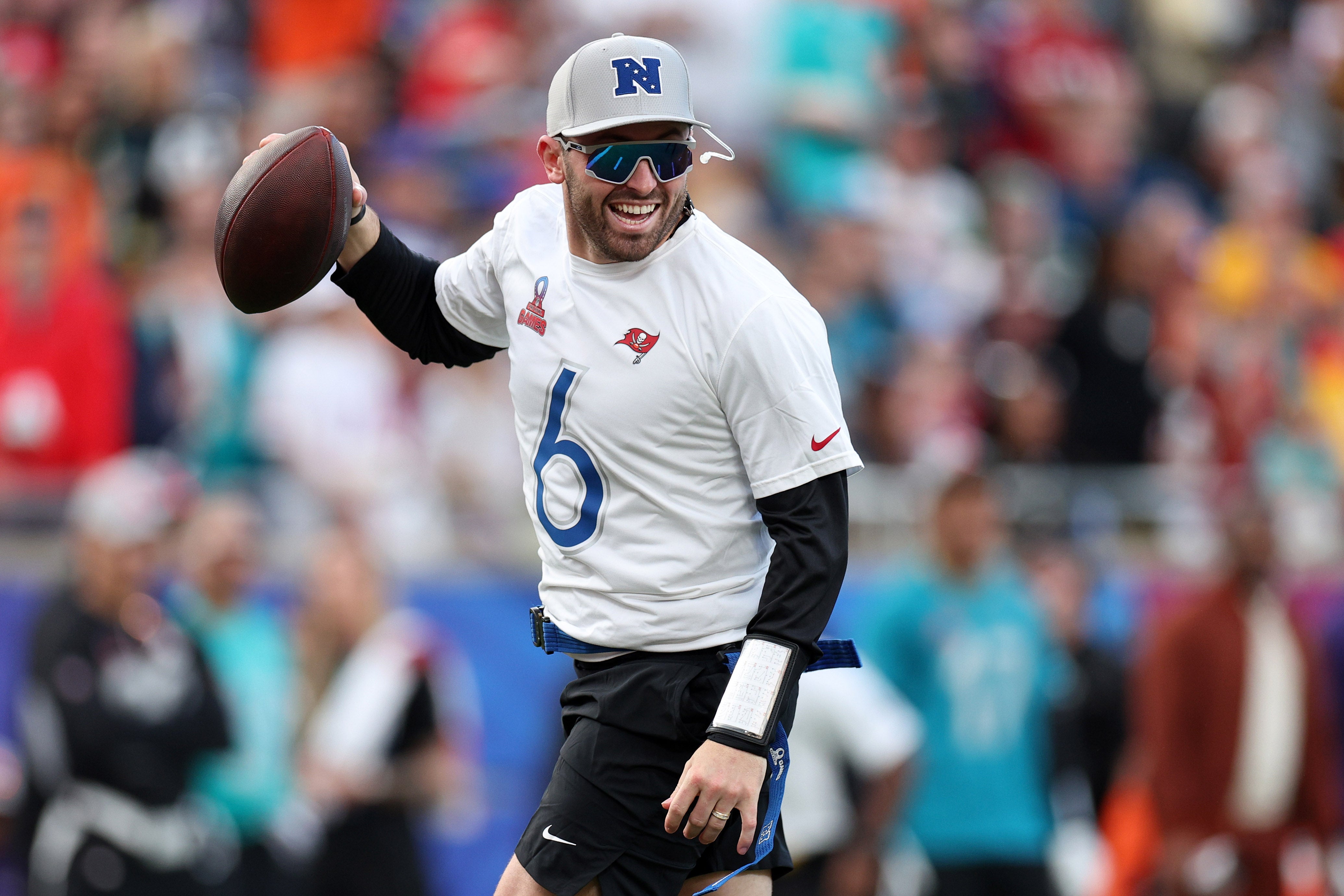 Feb 4, 2024; Orlando, FL, USA; NFC quarterback Baker Mayfield (60 of the Tampa Bay Buccaneers reacts against the AFC during the 2024 Pro Bowl at Camping World Stadium.