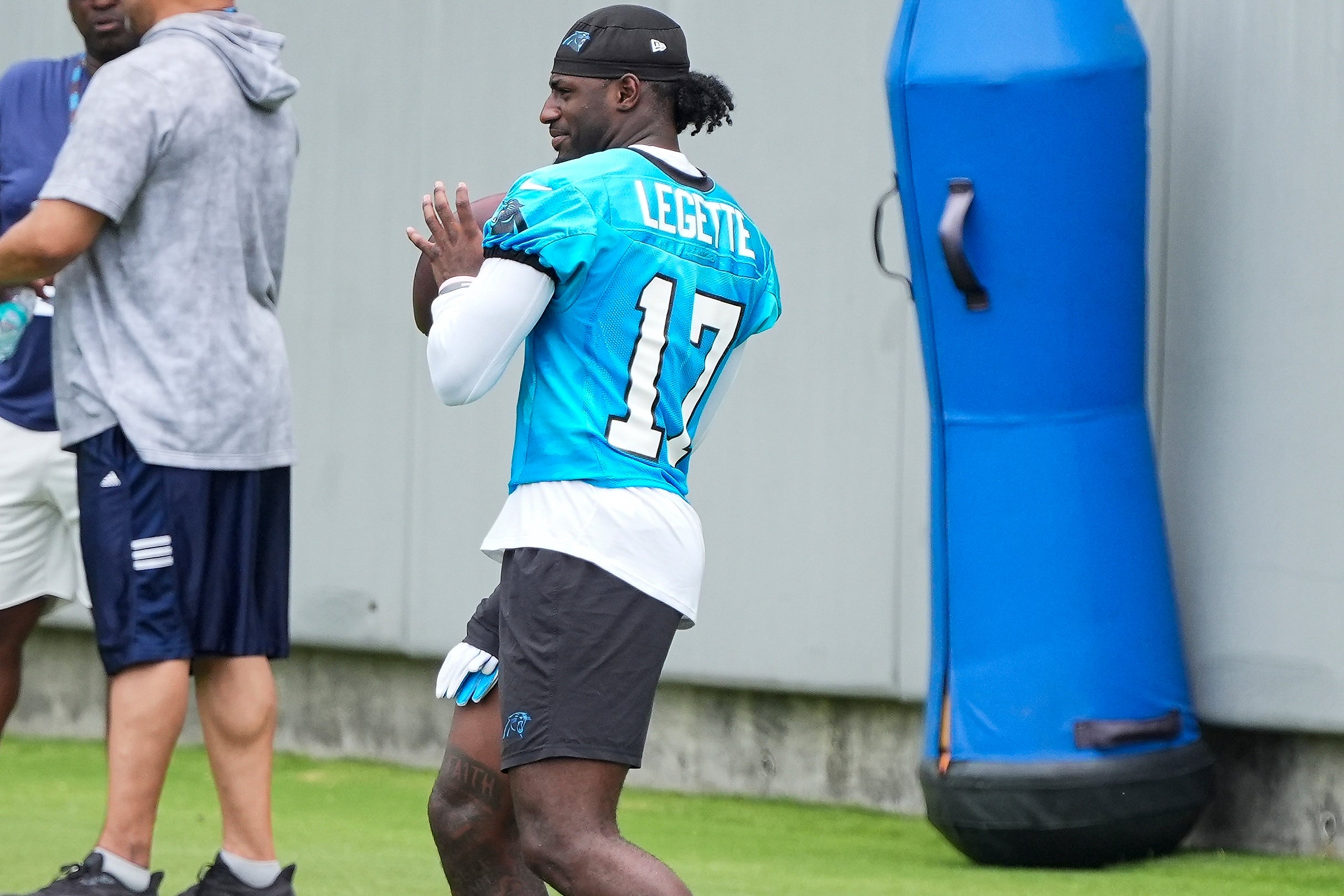 Jun 4, 2024; Charlotte, NC, USA; Carolina Panthers wide receiver Xavier Legette (17) throws during OTAs. Mandatory Credit: Jim Dedmon-USA TODAY Sports