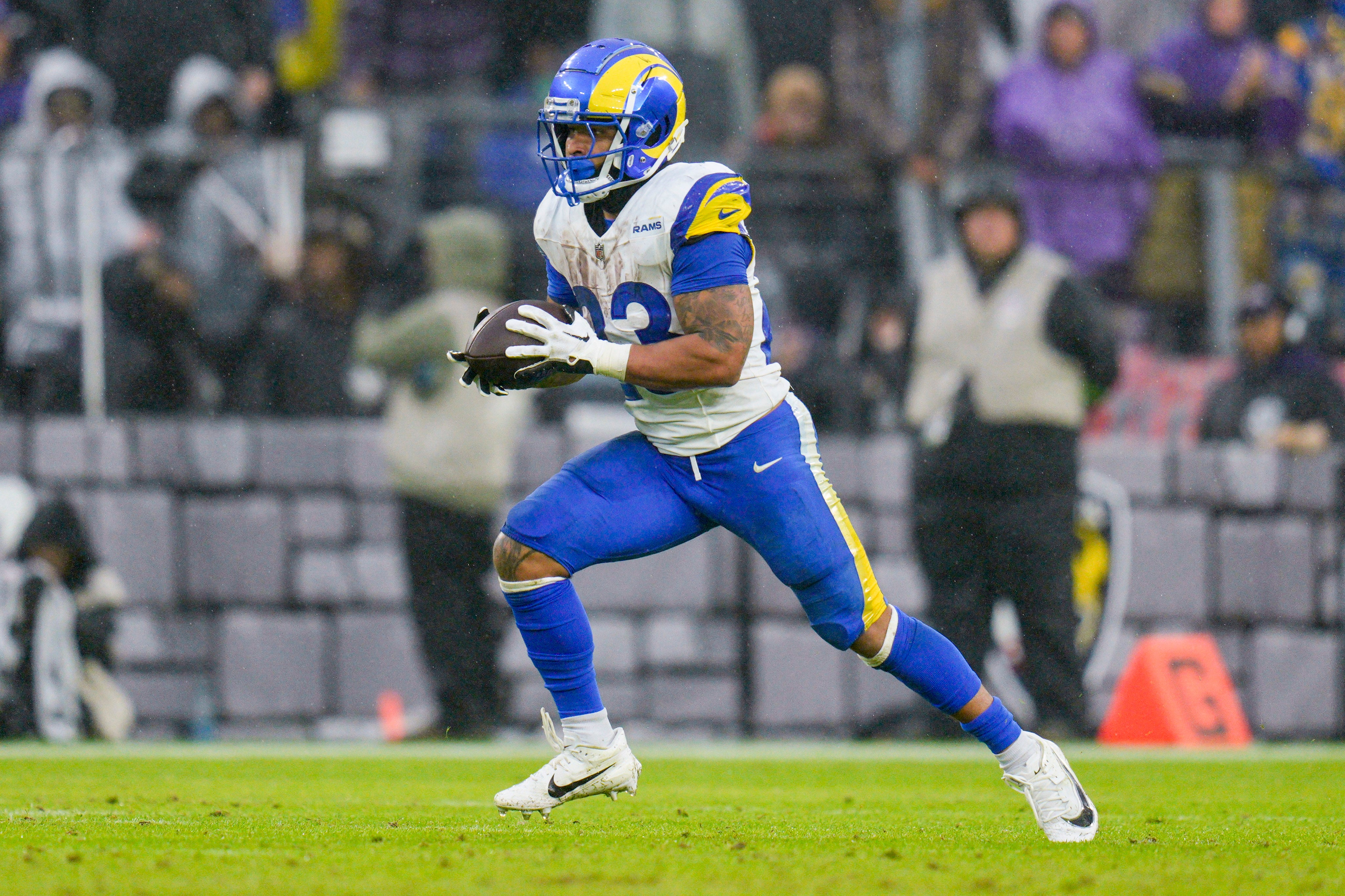 Los Angeles Rams running back Kyren Williams (23) runs with the ball during the third quarter against the Baltimore Ravens at M&T Bank Stadium.