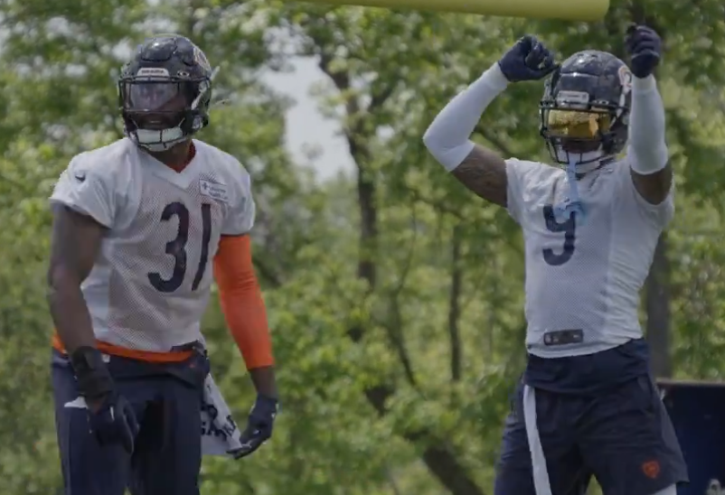Kevin Byard and Jaquan Brisker celebrate during practice at Halas Hall.