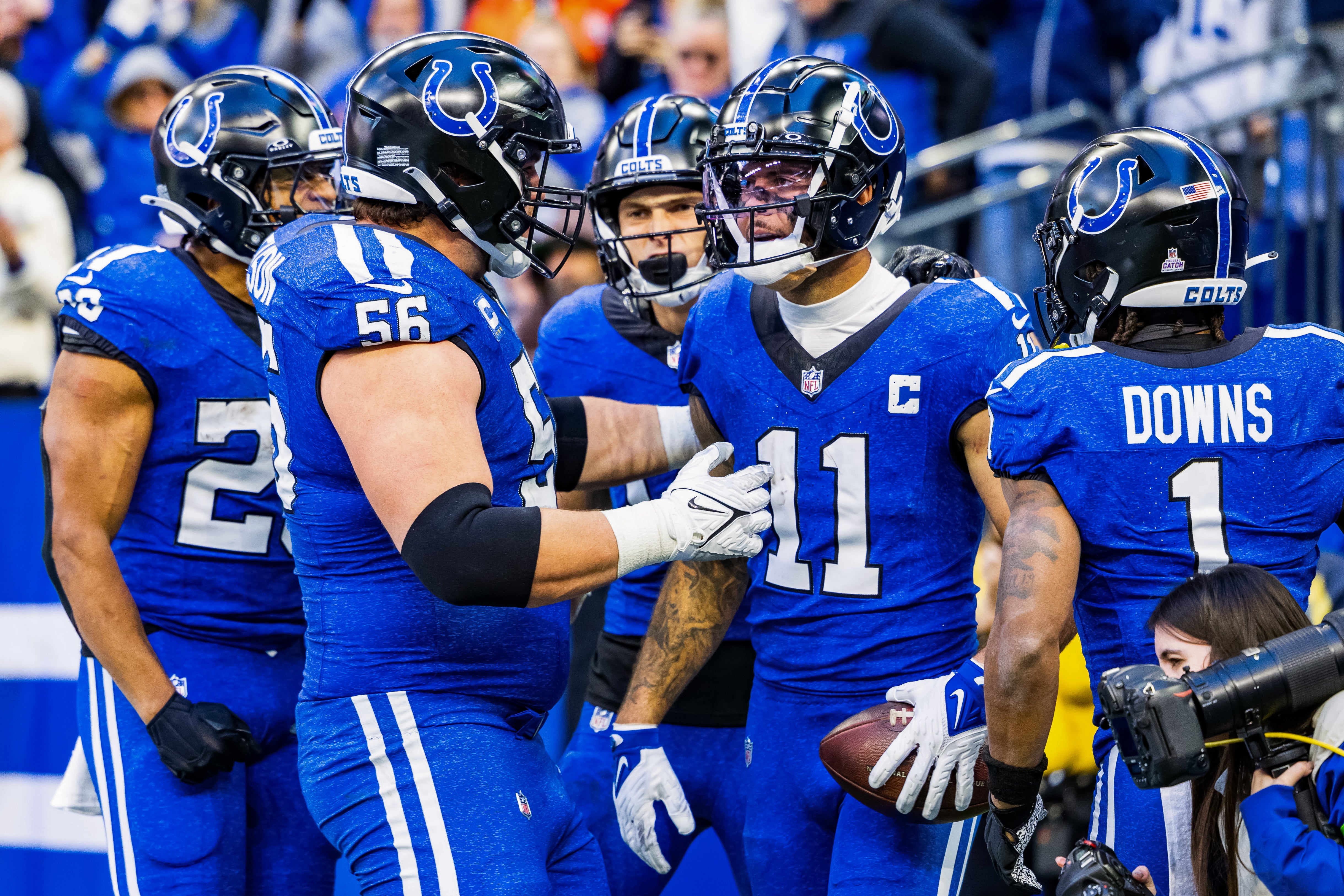 Oct 22, 2023; Indianapolis, Indiana, USA; Indianapolis Colts wide receiver Michael Pittman Jr. (11) celebrates his touchdown with teammates in the second half against the Cleveland Browns at Lucas Oil Stadium.