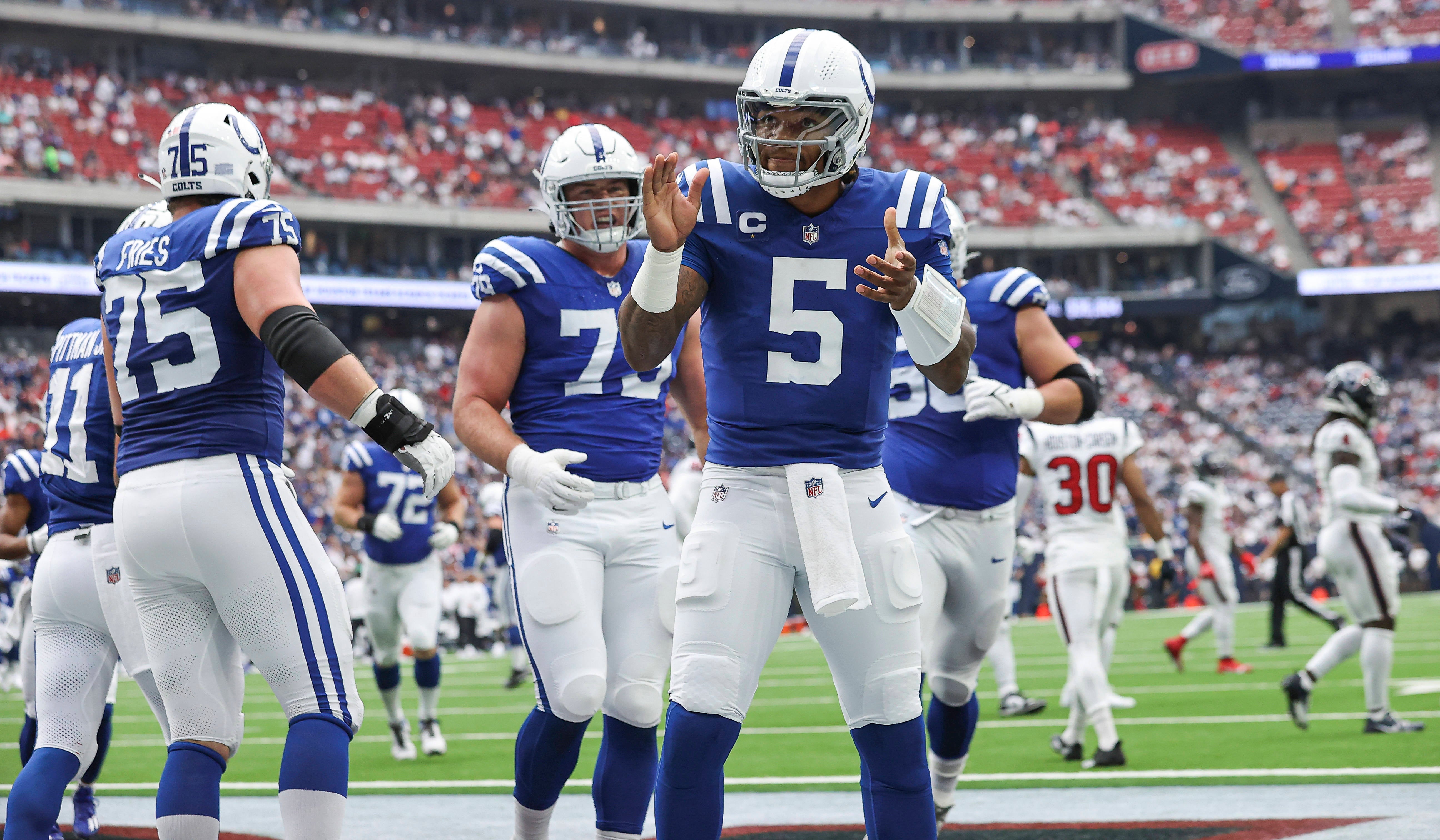 Sep 17, 2023; Houston, Texas, USA; Indianapolis Colts quarterback Anthony Richardson (5) celebrates after scoring a touchdown during the first quarter against the Houston Texans at NRG Stadium.