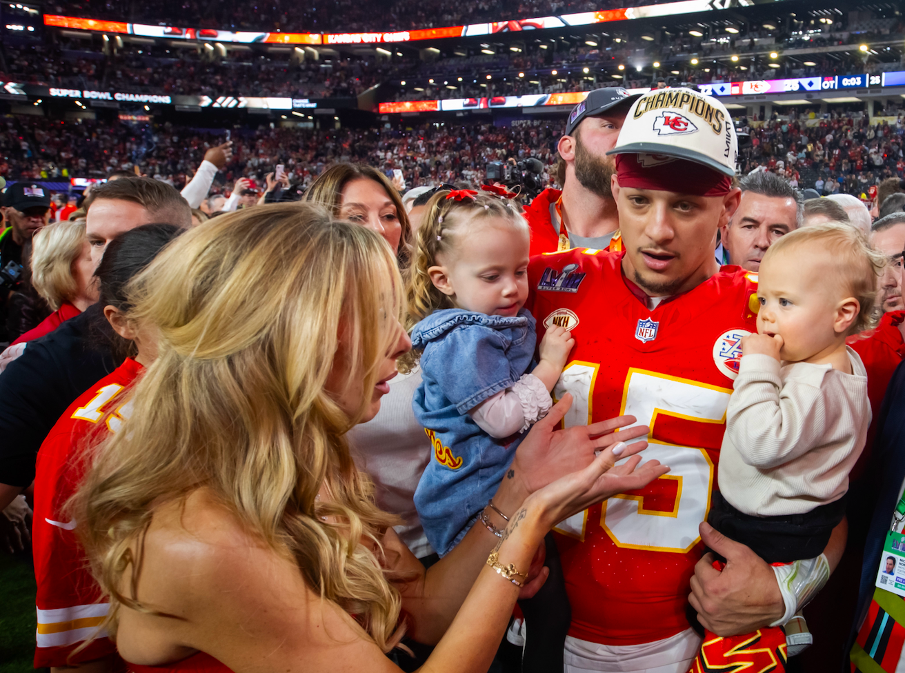 Feb 11, 2024; Paradise, Nevada, USA; Kansas City Chiefs quarterback Patrick Mahomes celebrates with wife Brittany Mahomes, daughter Sterling Mahomes and son Patrick Mahomes after defeating the San Francisco 49ers in Super Bowl LVIII at Allegiant Stadium