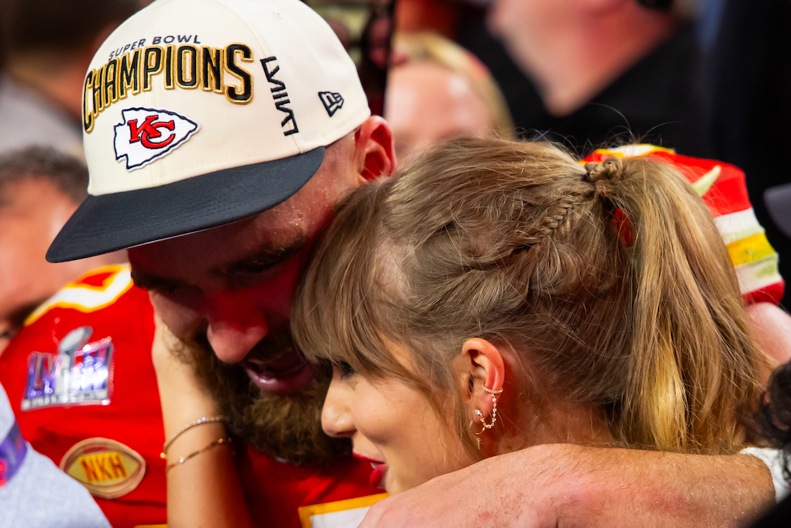 Feb 11, 2024; Paradise, Nevada, USA; Kansas City Chiefs tight end Travis Kelce (87) celebrates with girlfriend Taylor Swift after defeating the San Francisco 49ers in Super Bowl LVIII at Allegiant Stadium.
