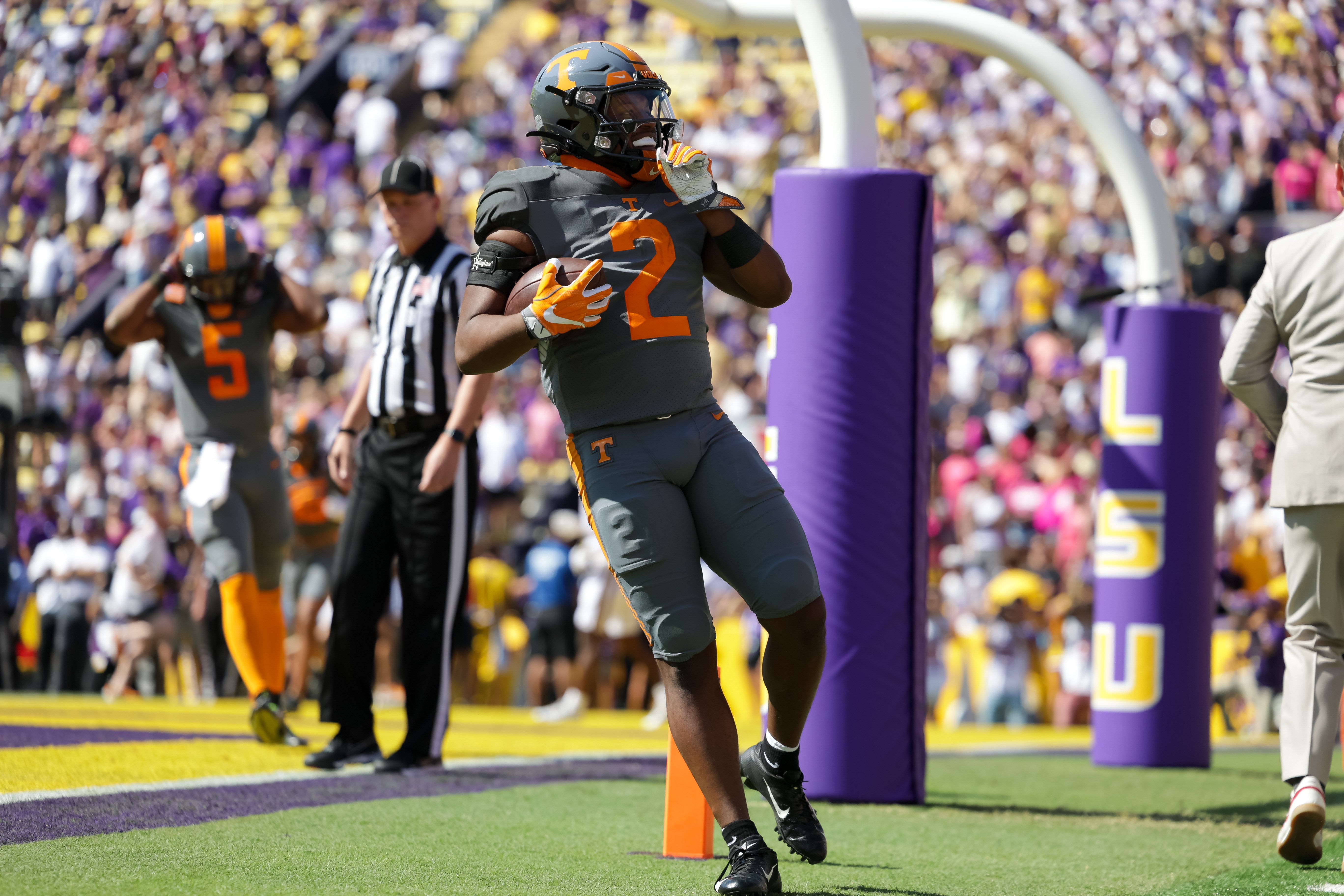 Oct 8, 2022; Baton Rouge, Louisiana, USA; Tennessee Volunteers running back Jabari Small (2) reacts to scoring a touchdown against the LSU Tigers during the first half at Tiger Stadium.