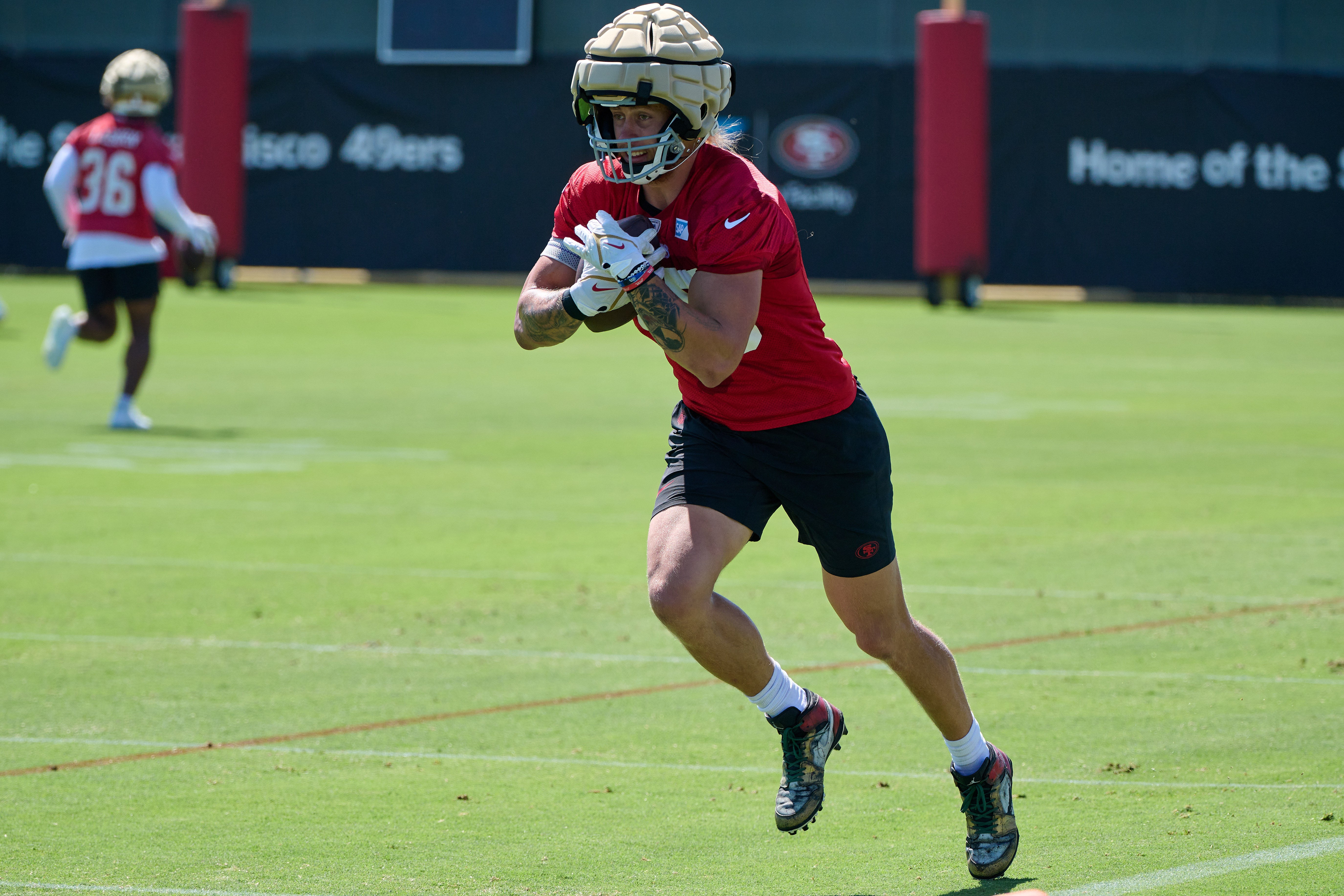 Jul 27, 2023; Santa Clara, CA, USA; San Francisco 49ers tight end George Kittle (85) runs with the ball after a catch during training camp at the SAP Performance Facility.