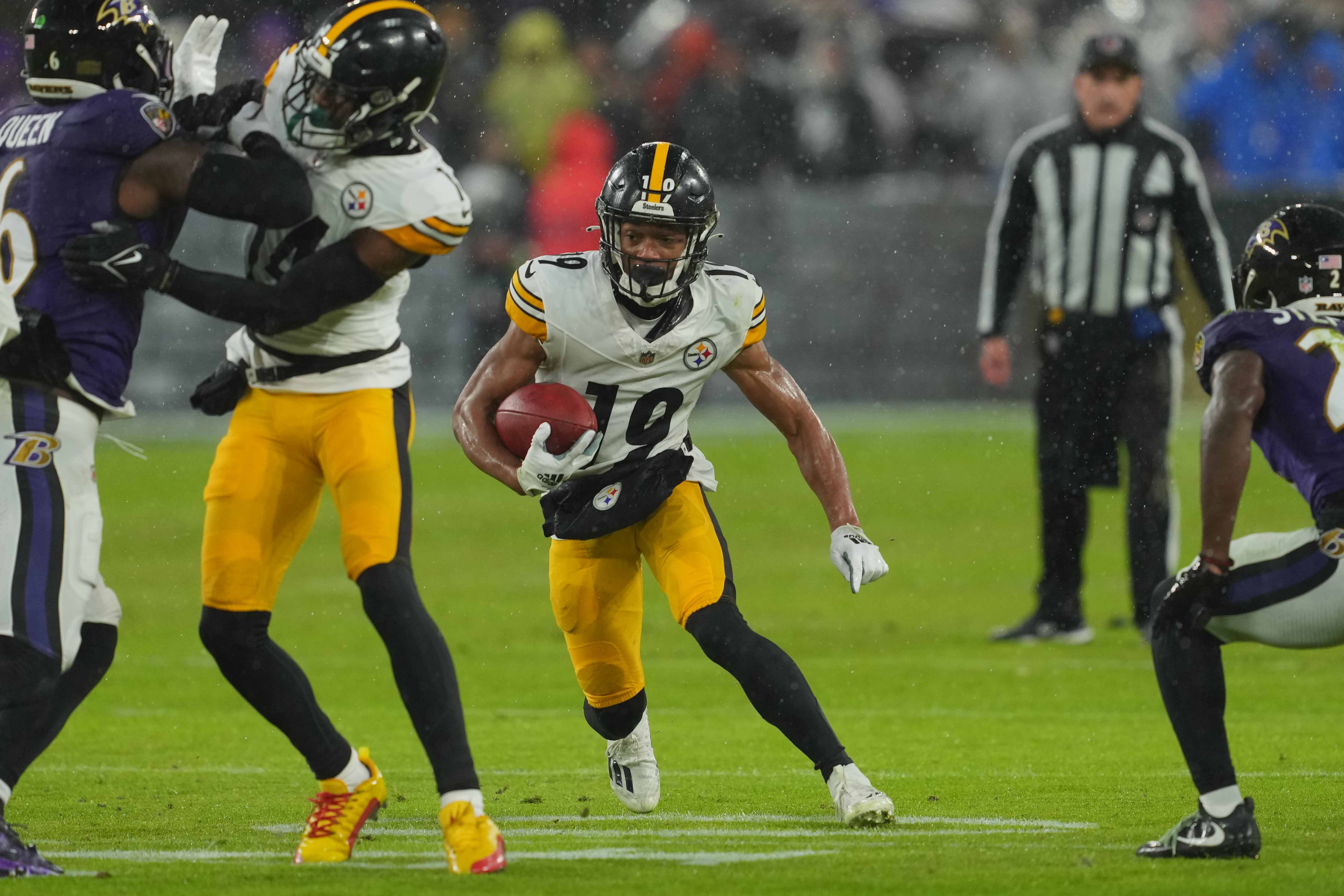 Jan 6, 2024; Baltimore, Maryland, USA; Pittsburgh Steelers wide receiver Calvin Austin III (19) gains yards after his catch in the first quarter against the Baltimore Ravens at M&T Bank Stadium. Mandatory Credit: Mitch Stringer-USA TODAY Sports