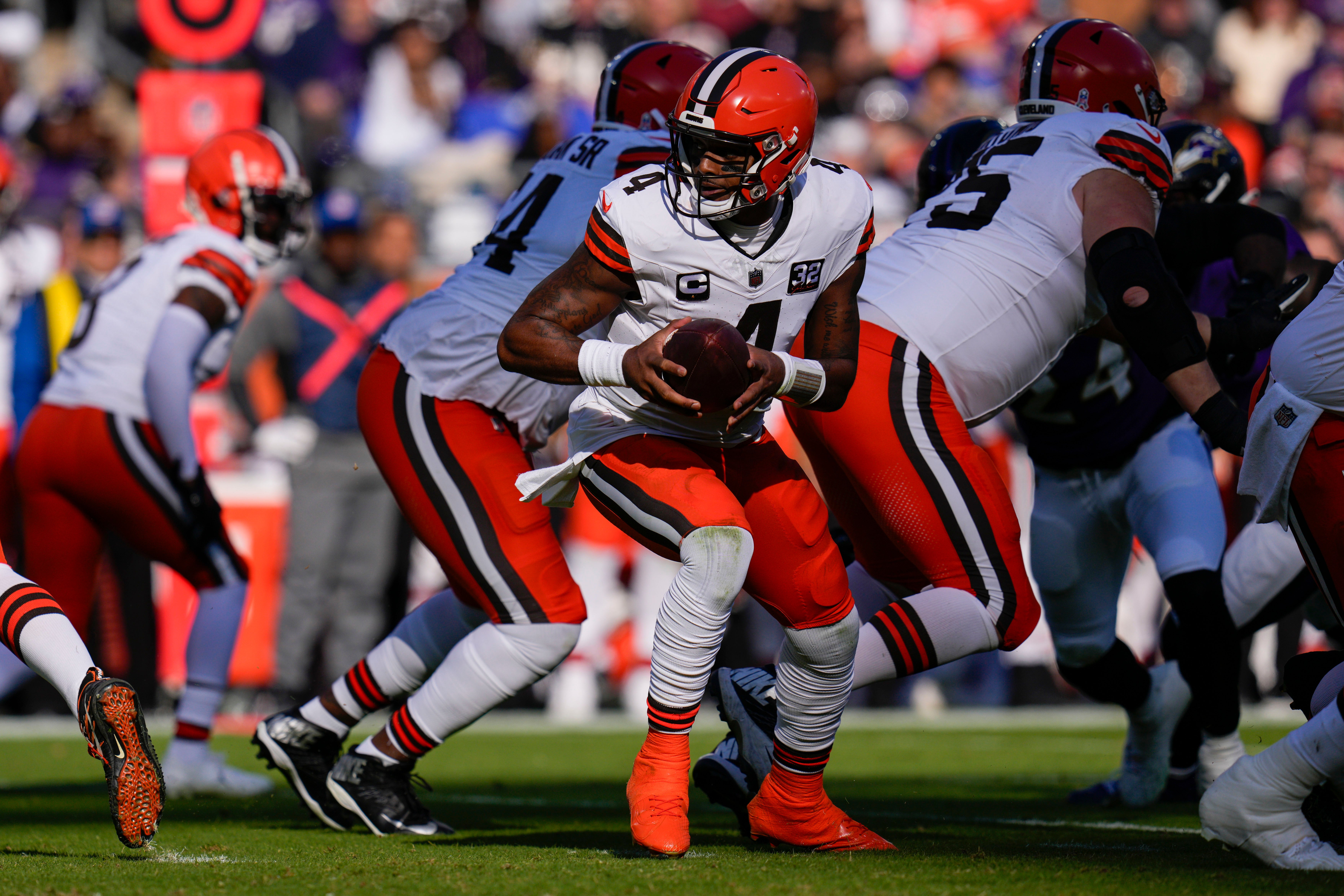 Nov 12, 2023; Baltimore, Maryland, USA; Cleveland Browns quarterback Deshaun Watson (4) scrambles against the Cleveland Browns during the first half at M&T Bank Stadium. Mandatory Credit: Jessica Rapfogel-USA TODAY Sports
