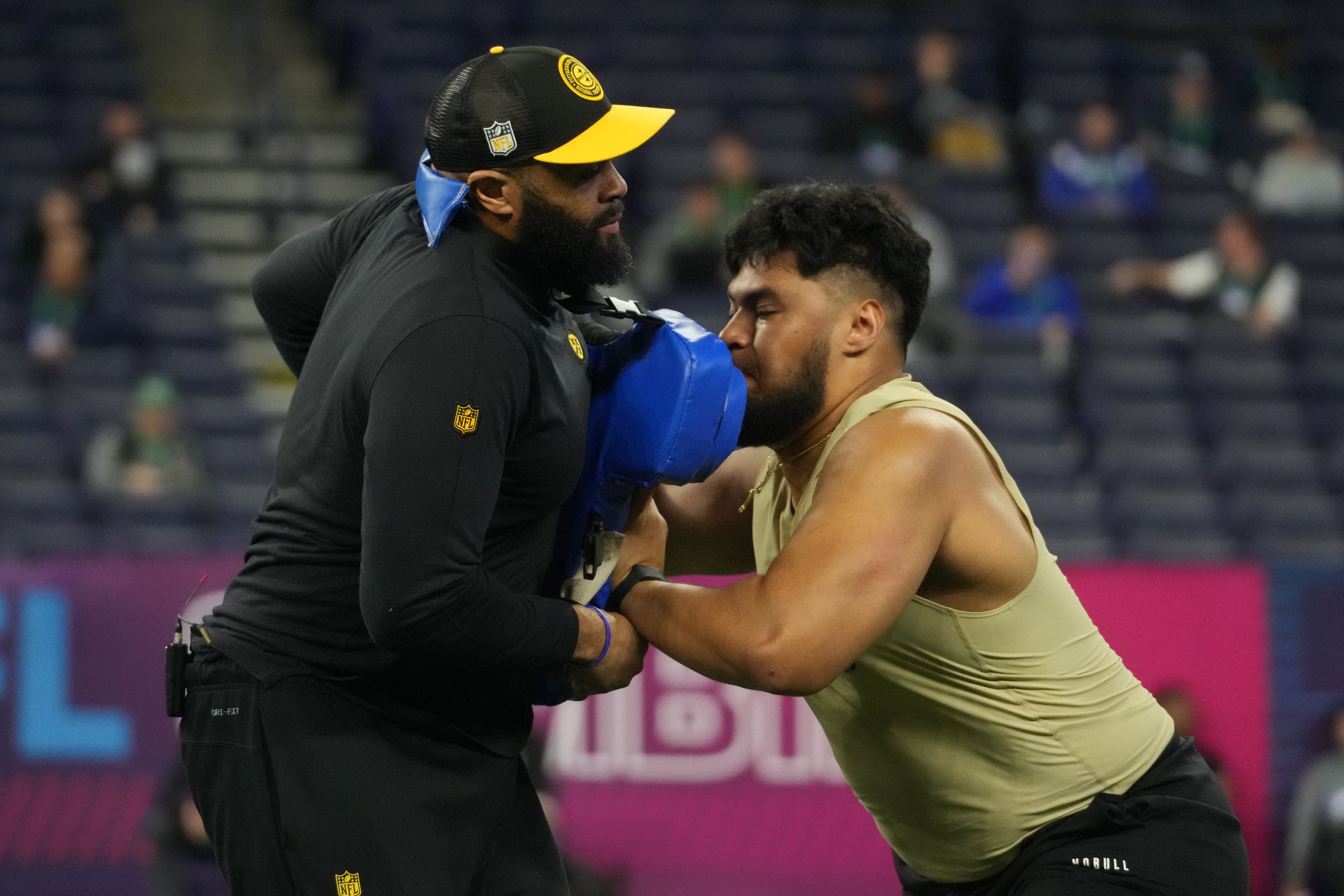 Mar 3, 2024; Indianapolis, IN, USA; Washington offensive lineman Troy Fautanu (OL19) during the 2024 NFL Combine at Lucas Oil Stadium. Mandatory Credit: Kirby Lee-USA TODAY Sports
