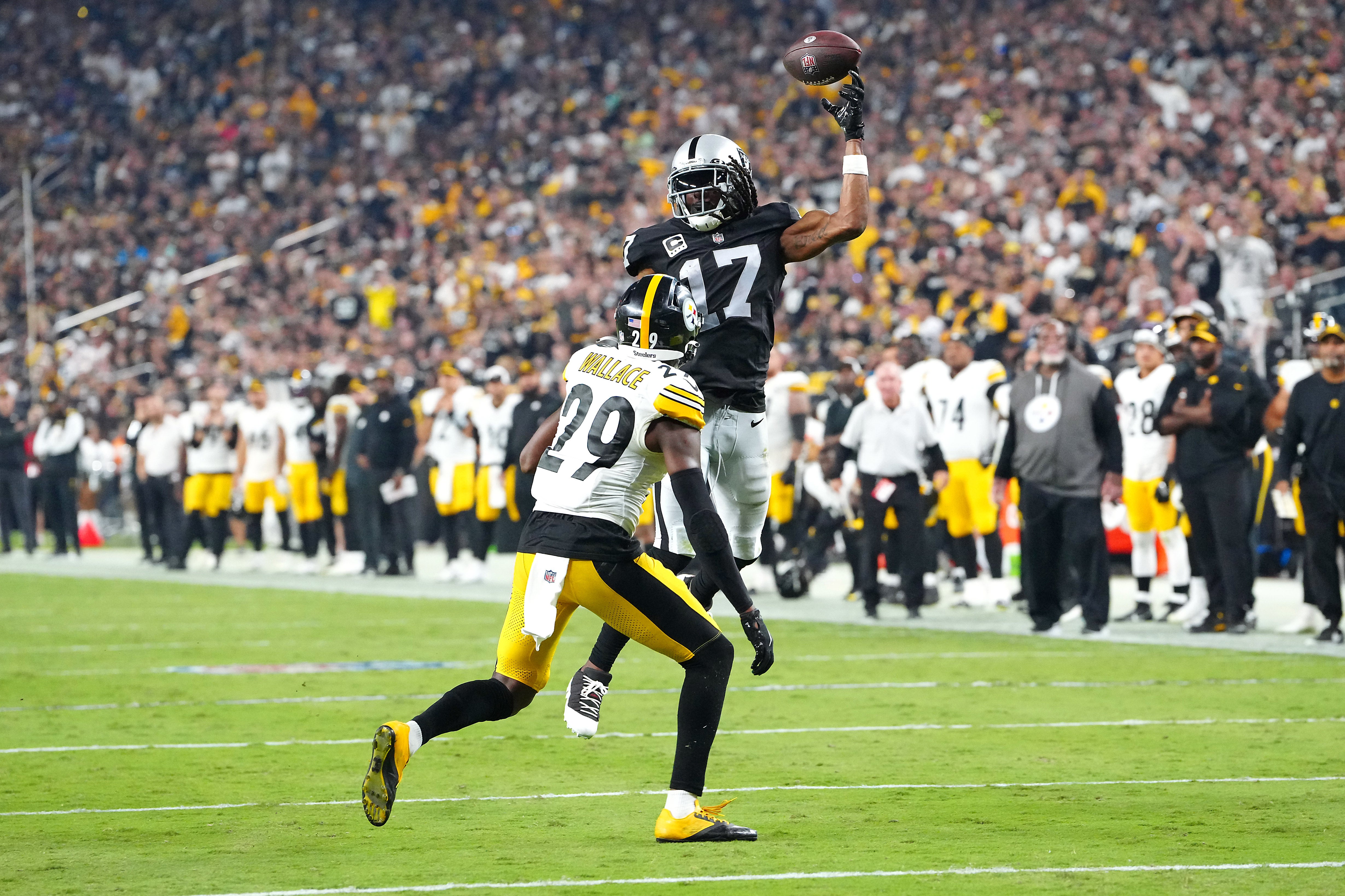 Sep 24, 2023; Paradise, Nevada, USA; Las Vegas Raiders wide receiver Davante Adams (17) misses a pass attempt as Pittsburgh Steelers cornerback Levi Wallace (29) defends during the fourth quarter at Allegiant Stadium. Mandatory Credit: Stephen R. Sylvanie-USA TODAY Sports  