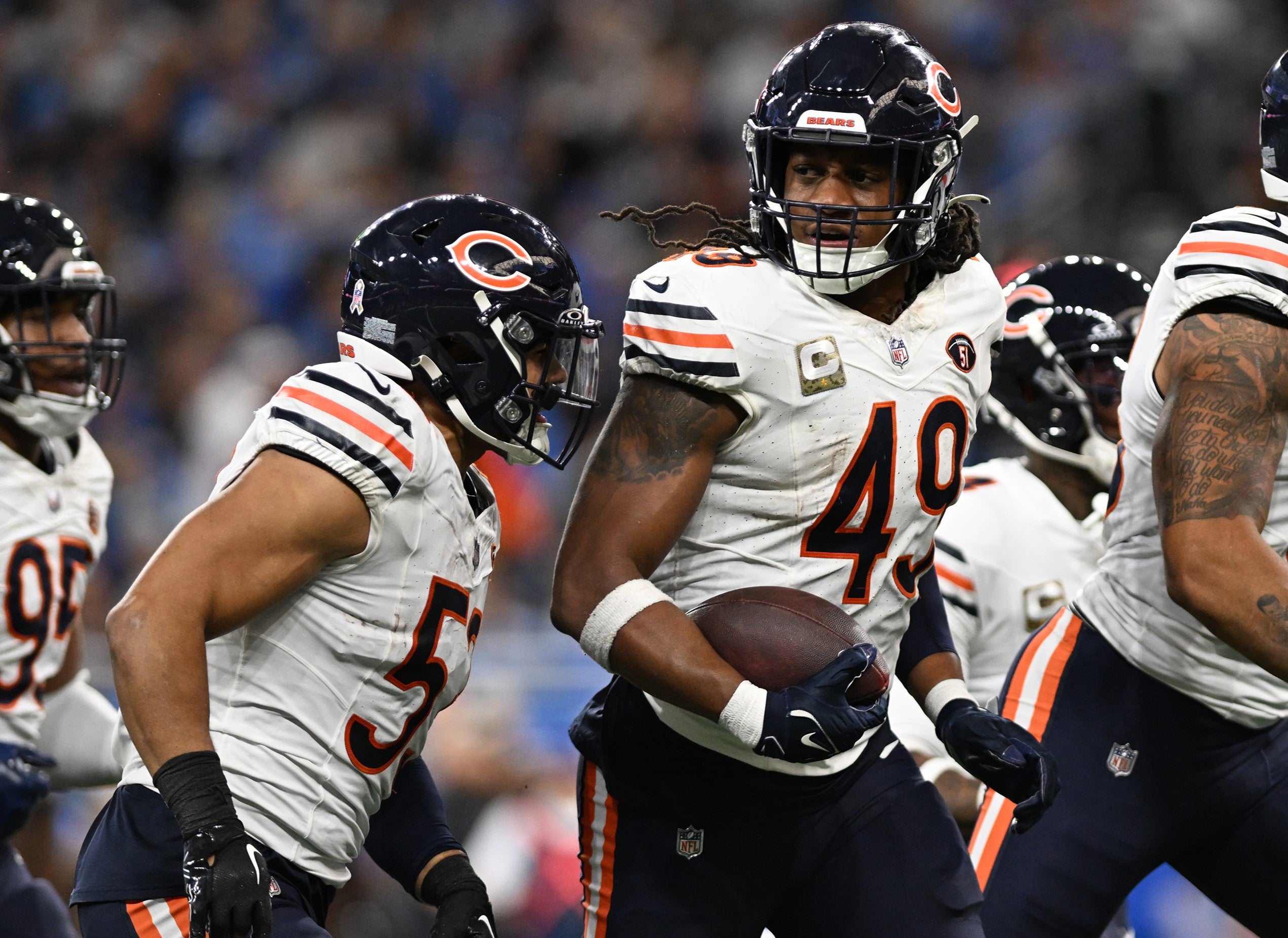 Nov 19, 2023; Detroit, Michigan, USA; Chicago Bears linebacker Tremaine Edmunds (49) celebrates with teammates after intercepting a pass against the Detroit Lions in the third quarter at Ford Field.