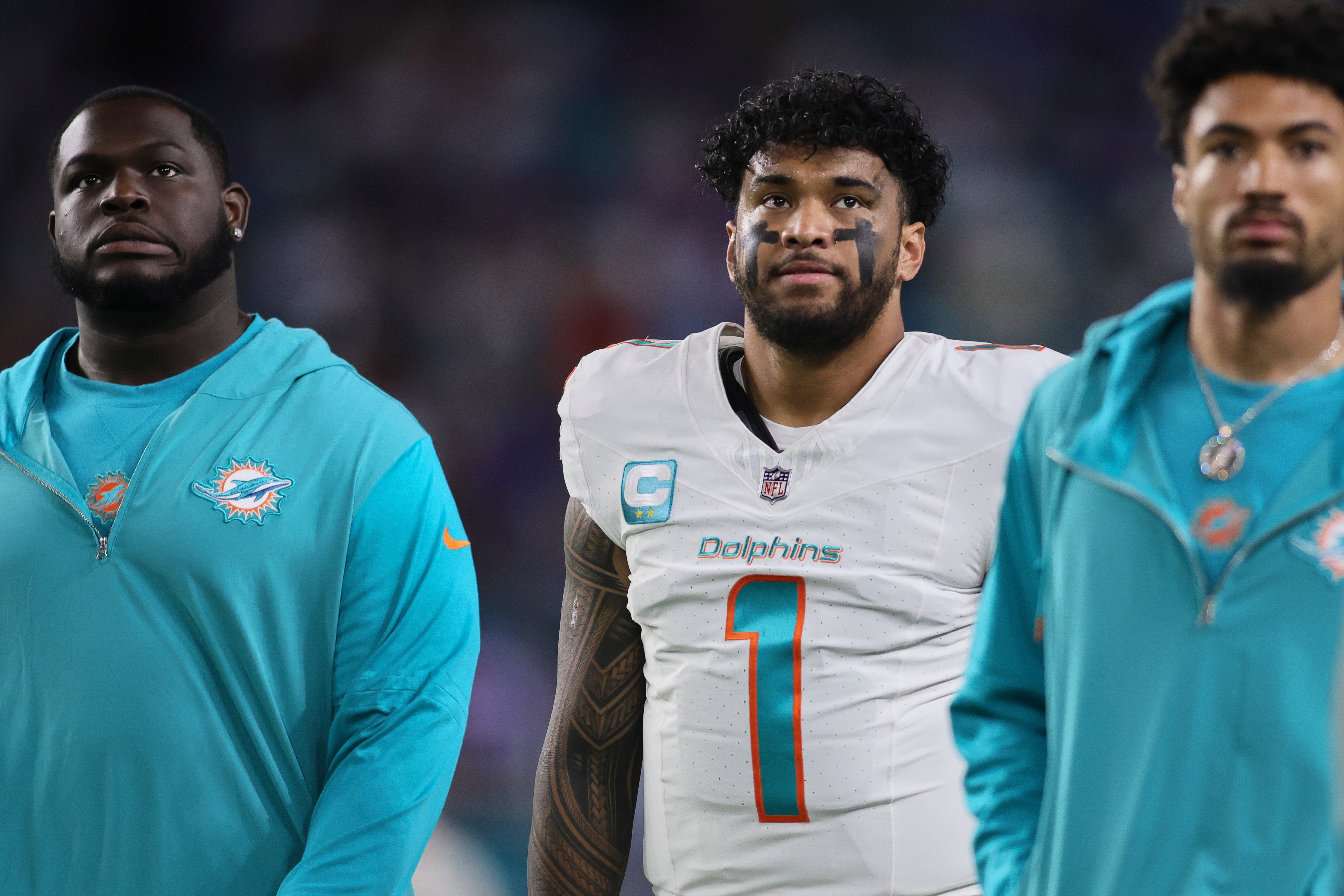 Jan 7, 2024; Miami Gardens, Florida, USA; Miami Dolphins quarterback Tua Tagovailoa (1) looks on from the field prior to the game against the Buffalo Bills at Hard Rock Stadium.