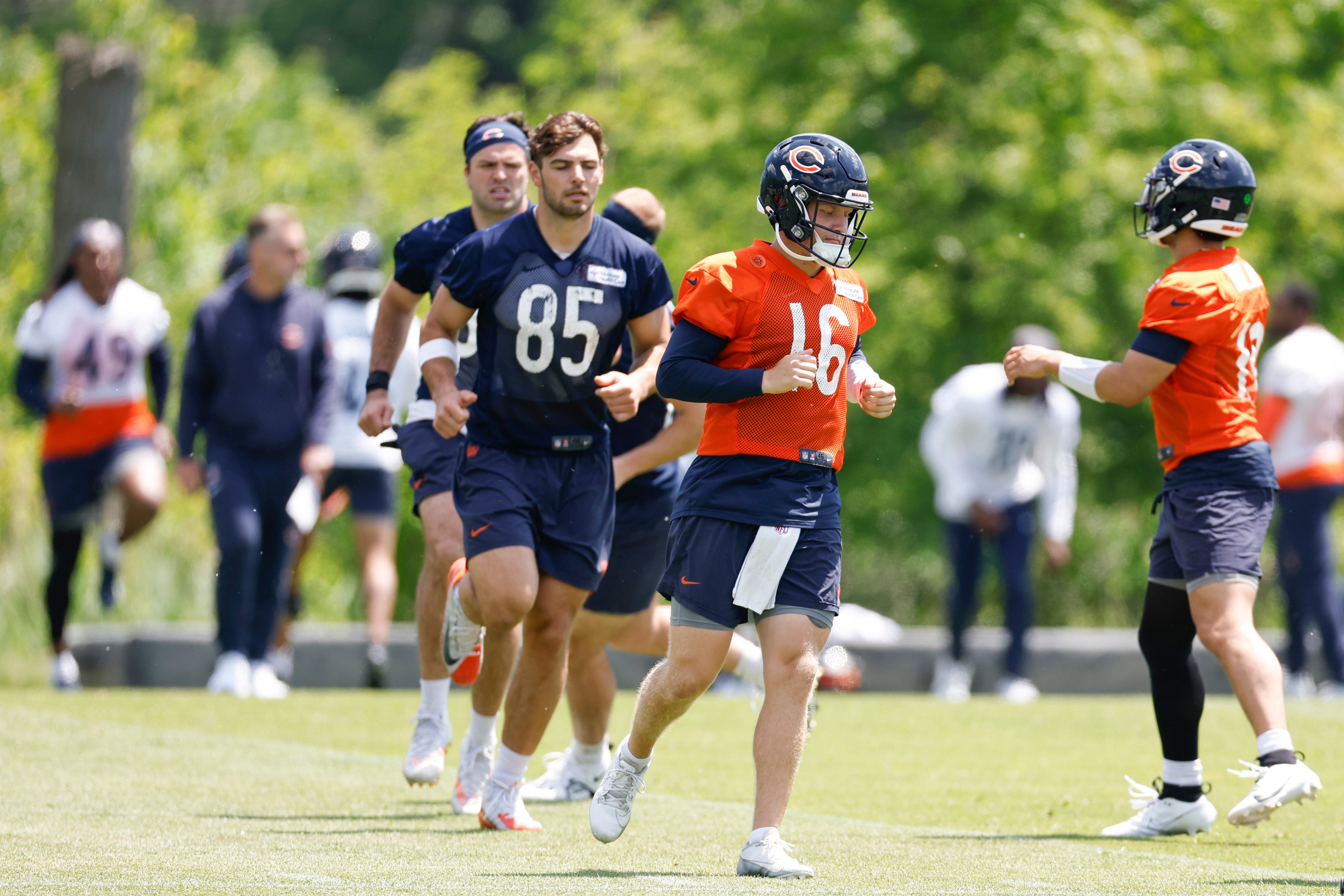 May 23, 2024; Lake Forest, IL, USA; Chicago Bears quarterback Austin Reed (16) warms up during organized team activities at Halas Hall.