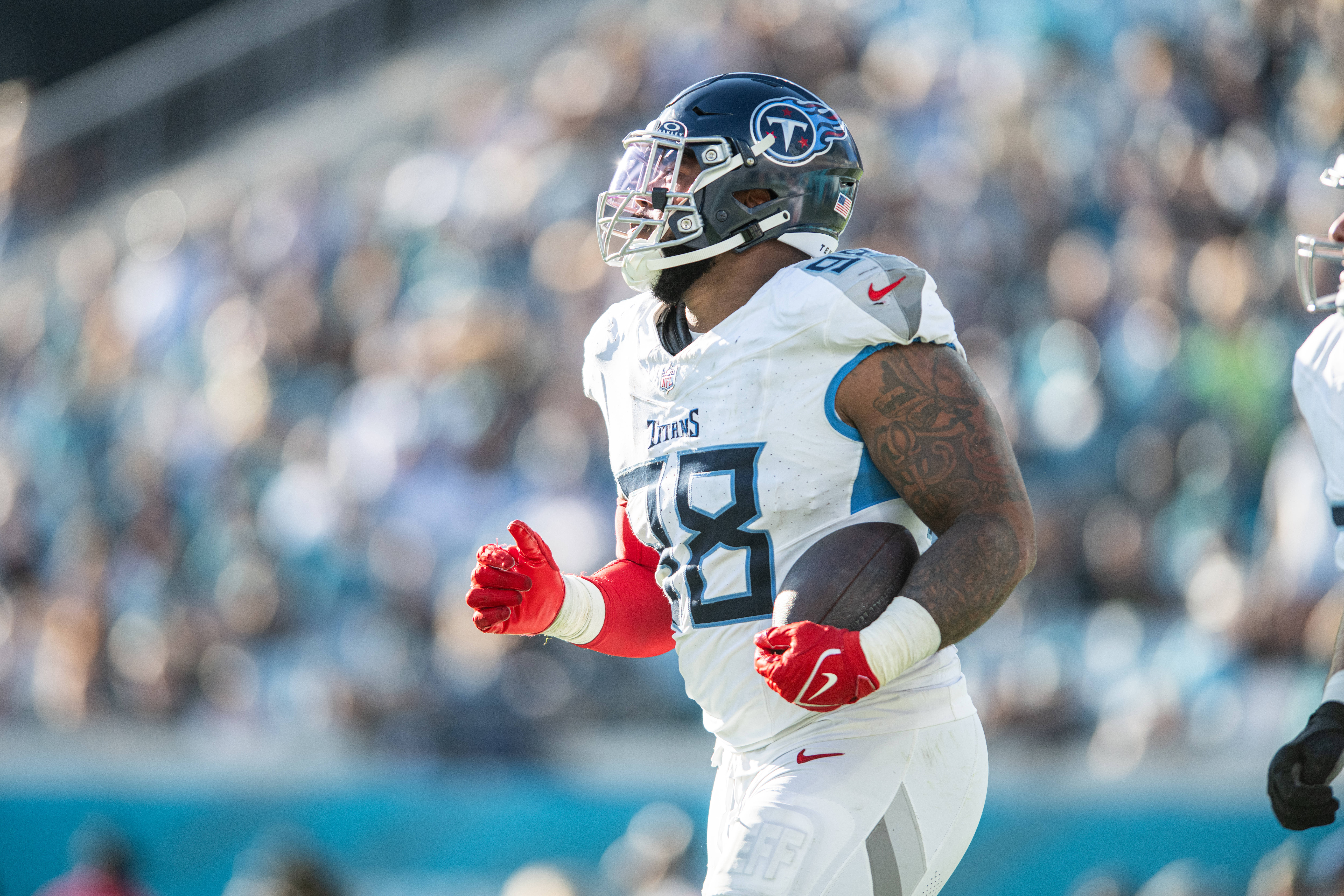 Tennessee Titans defensive tackle Jeffery Simmons (98) celebrates a touchdown against the Jacksonville Jaguars in the fourth quarter at EverBank Stadium. Jeremy Reper-USA TODAY Sports