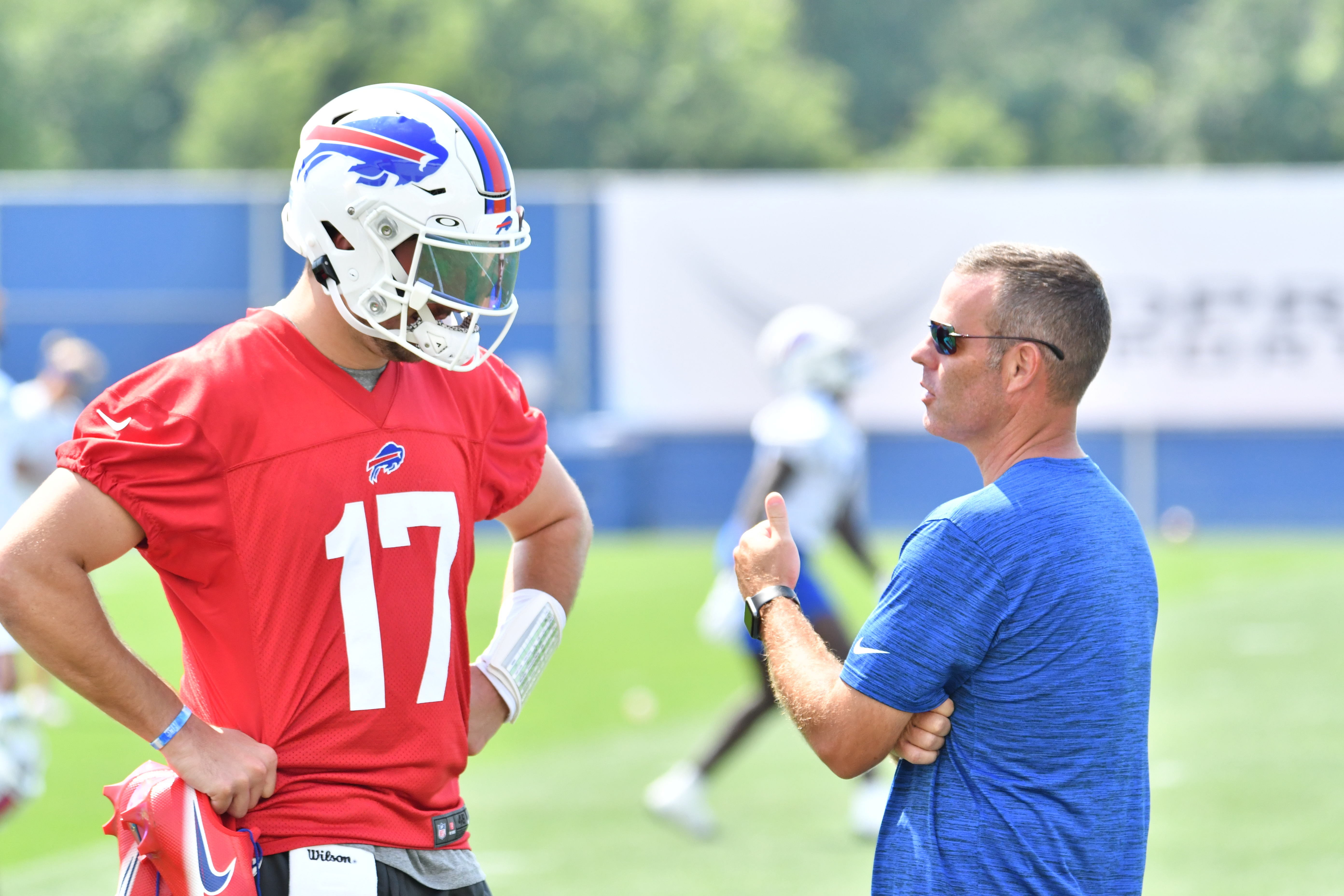 Buffalo Bills general manager Brandon Beane has a word with quarterback Josh Allen (17) after practice at the Buffalo Bills Training Facility.