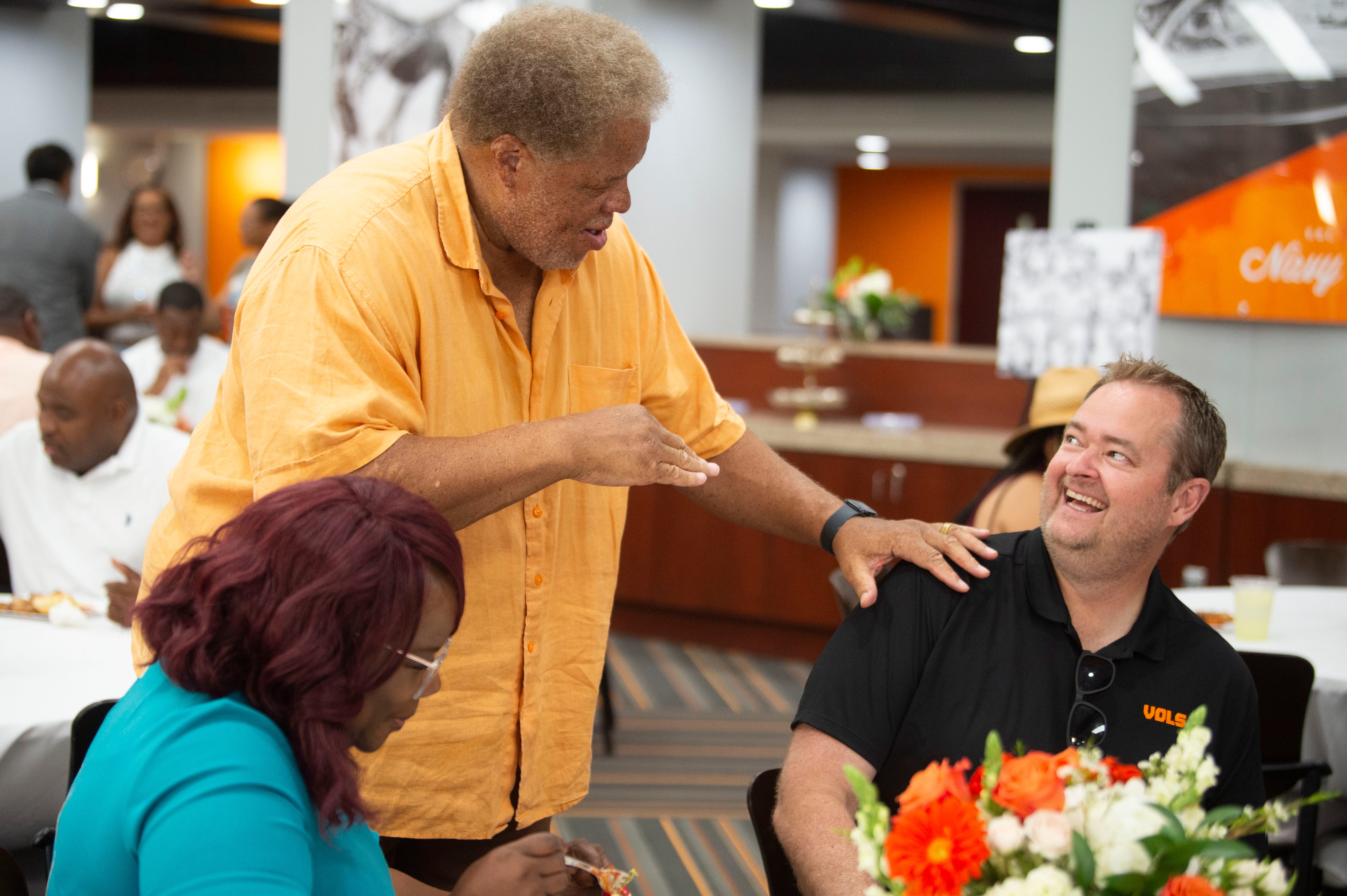 Reginal McKenzie chats with Josh Heupel at the Camp Evolve reception on Monday, June 17, 2024.