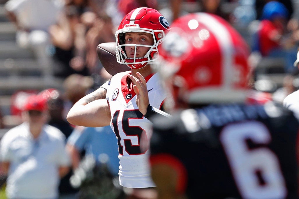 Georgia quarterback Carson Beck (15) looks to throw a pass during the G-Day spring football game in Athens, Ga., on Saturday, April 13, 2024.