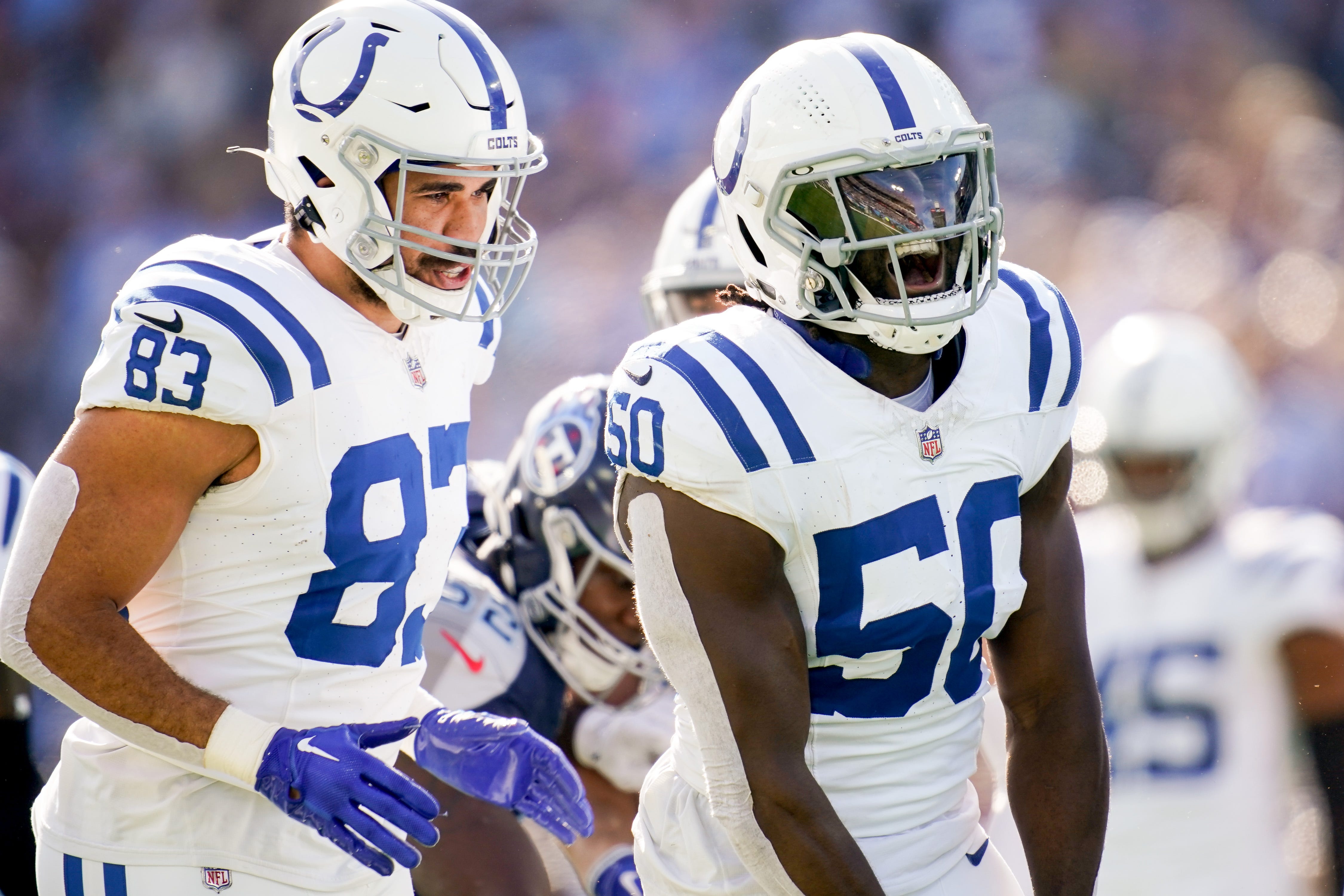 Indianapolis Colts linebacker Segun Olubi (50) celebrates tackling Tennessee Titans running back Tyjae Spears during the first quarter at Nissan Stadium in Nashville, Tenn., Sunday, Dec. 3, 2023.