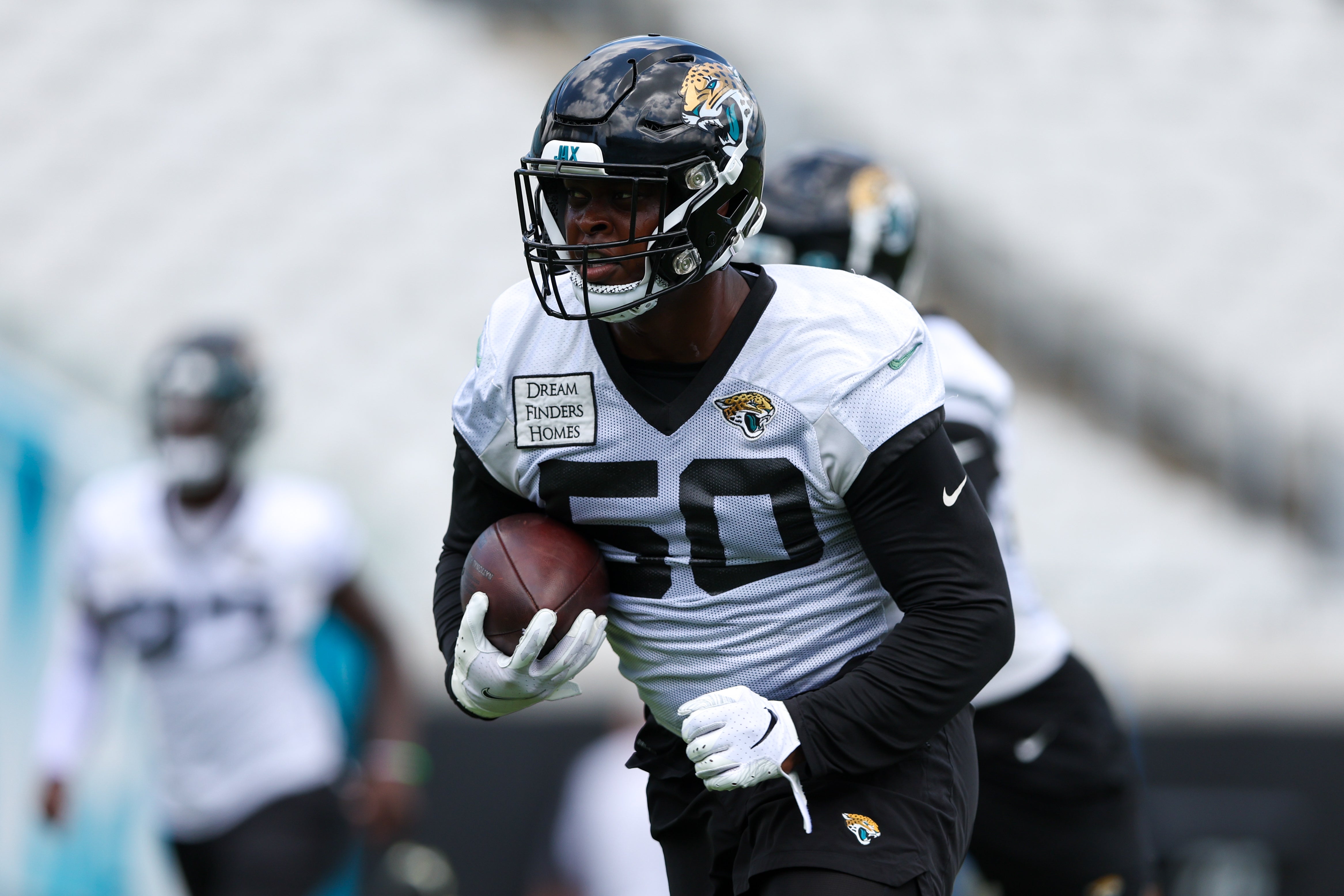 Jun 13, 2023; Jacksonville, Florida, USA; Jacksonville Jaguars linebacker Shaquille Quarterman (50) participates in mandatory mini camp at TIAA Bank field.