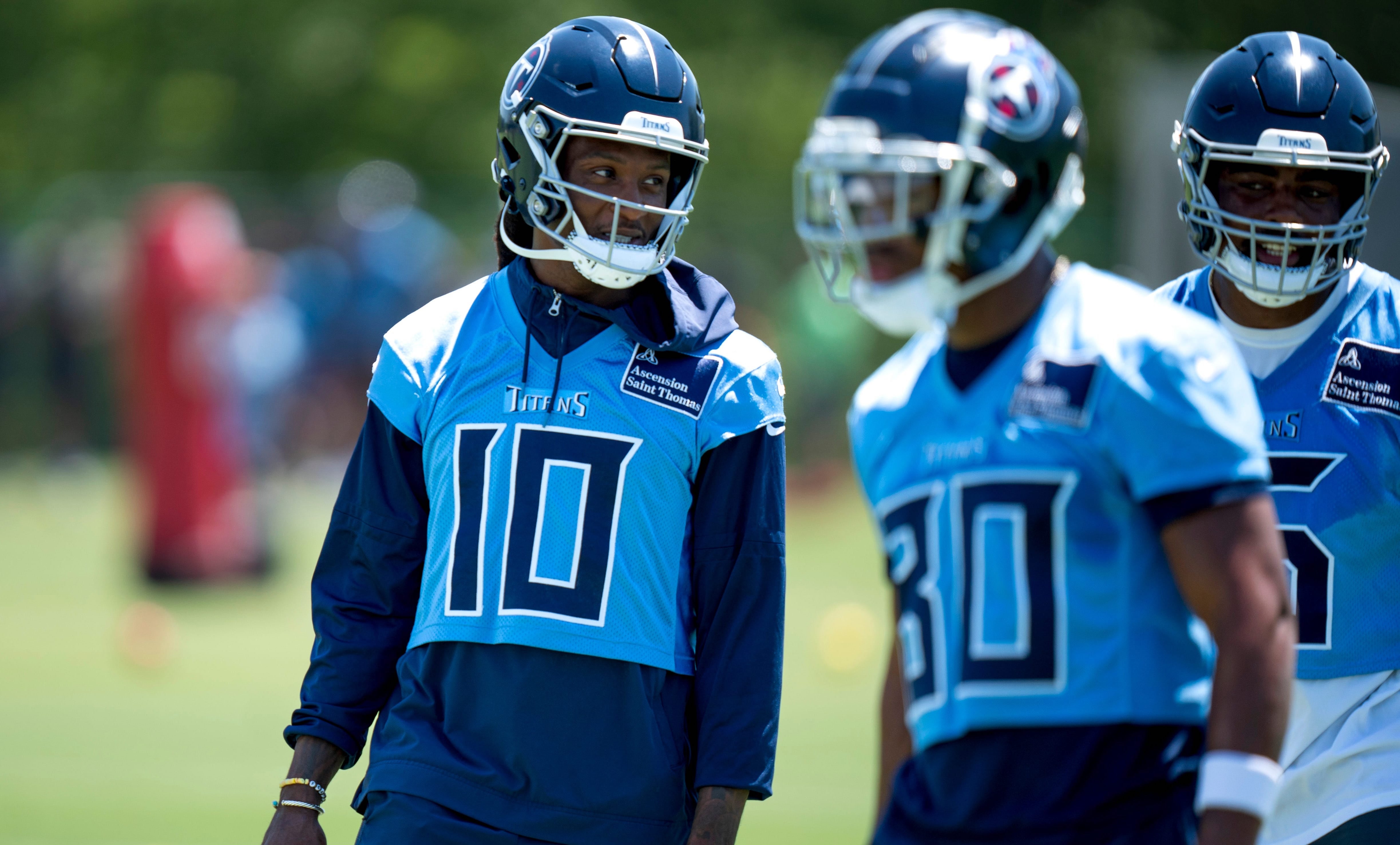Wide receiver DeAndre Hopkins (10) and wide receiver Treylon Burks (16) communicate during Tennessee Titans practice at Ascension Saint Thomas Sports Park in Nashville, Tenn., Tuesday, May 21, 2024 Denny Simmons / The Tennessean-USA TODAY NETWORK