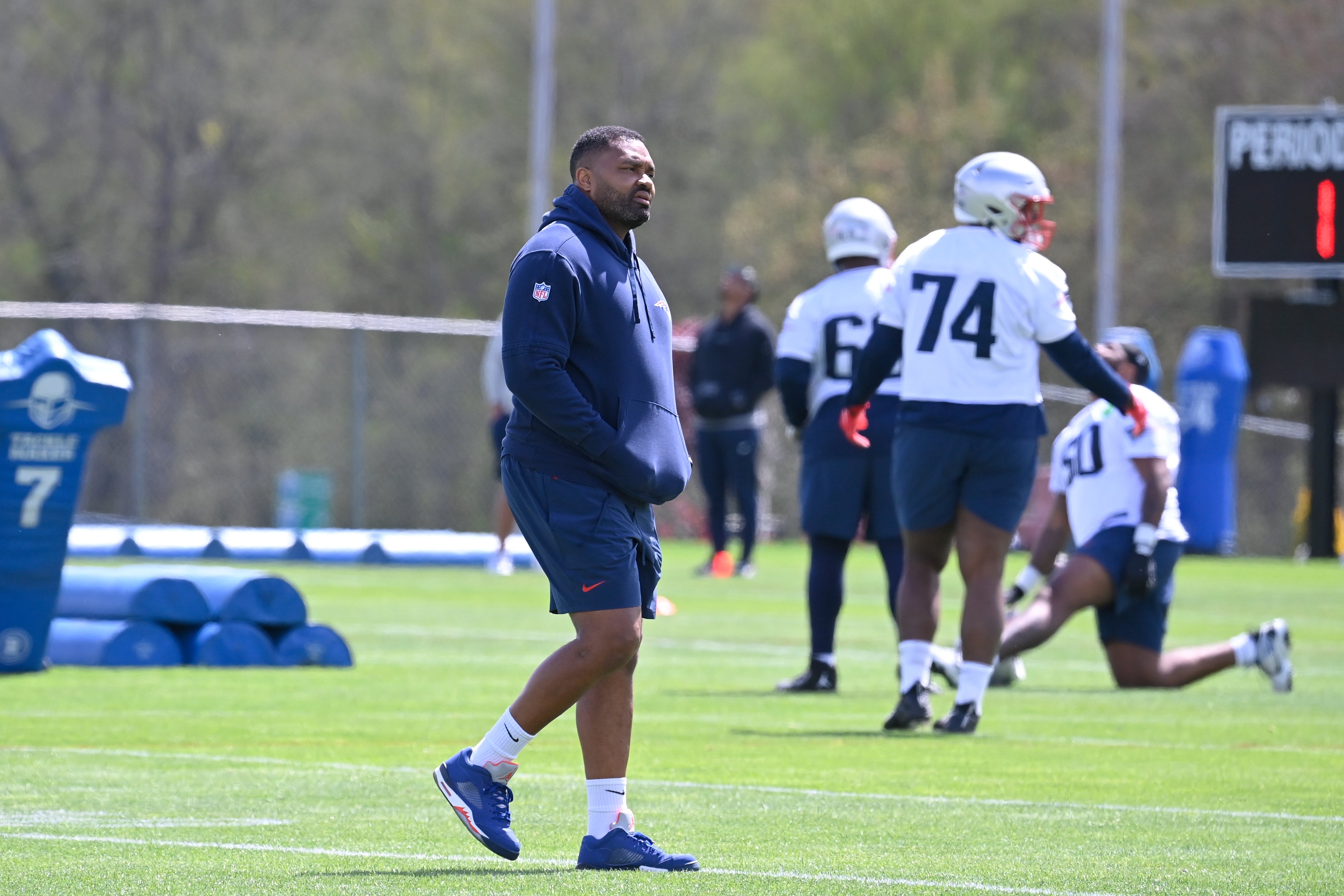 May 11, 2024; Foxborough, MA, USA; New England Patriots head coach Jerod Mayo watches practice at the New England Patriots rookie camp at Gillette Stadium.