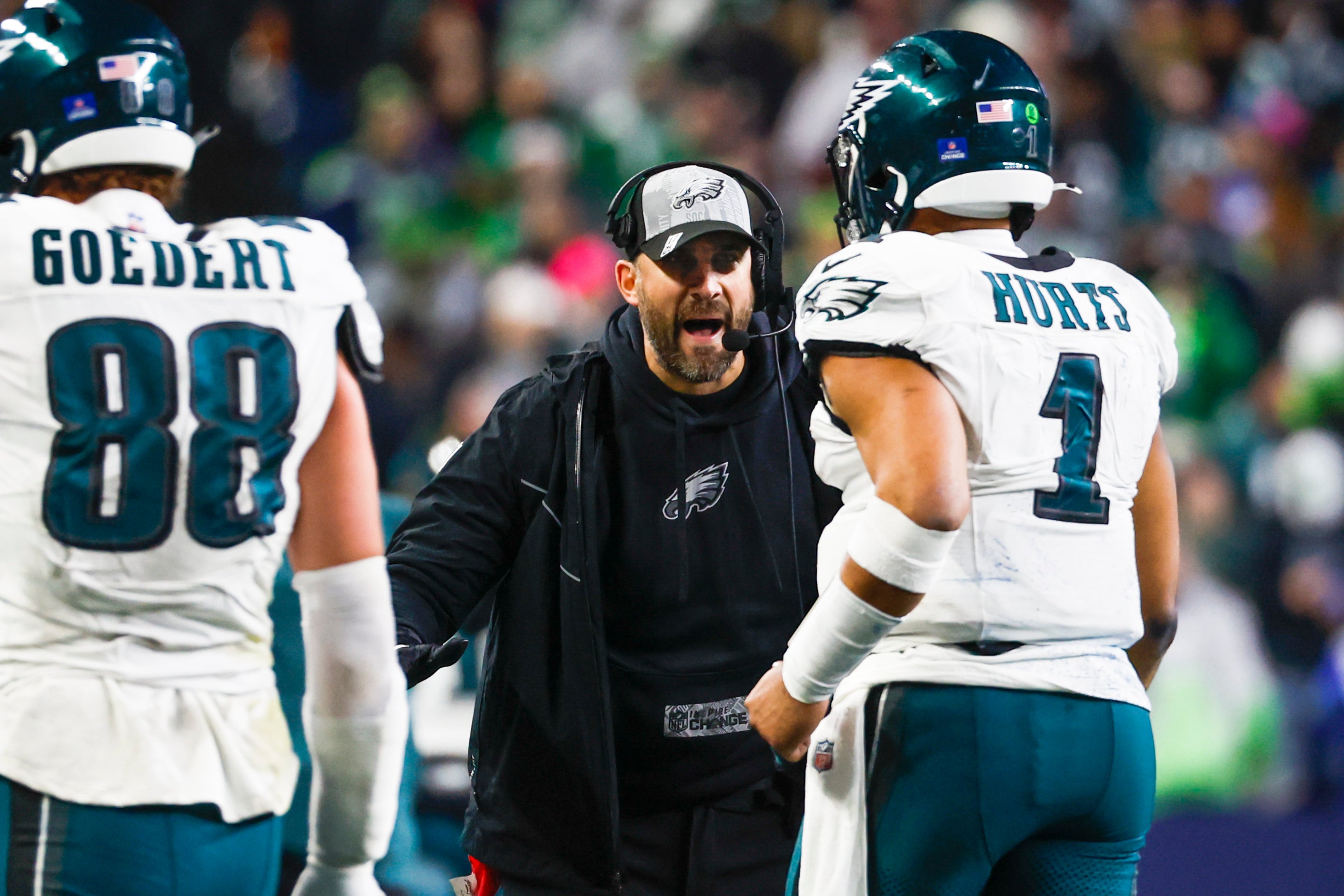 Philadelphia Eagles head coach Nick Sirianni greets quarterback Jalen Hurts (1) following a touchdown against the Seattle Seahawks during the third quarter at Lumen Field.