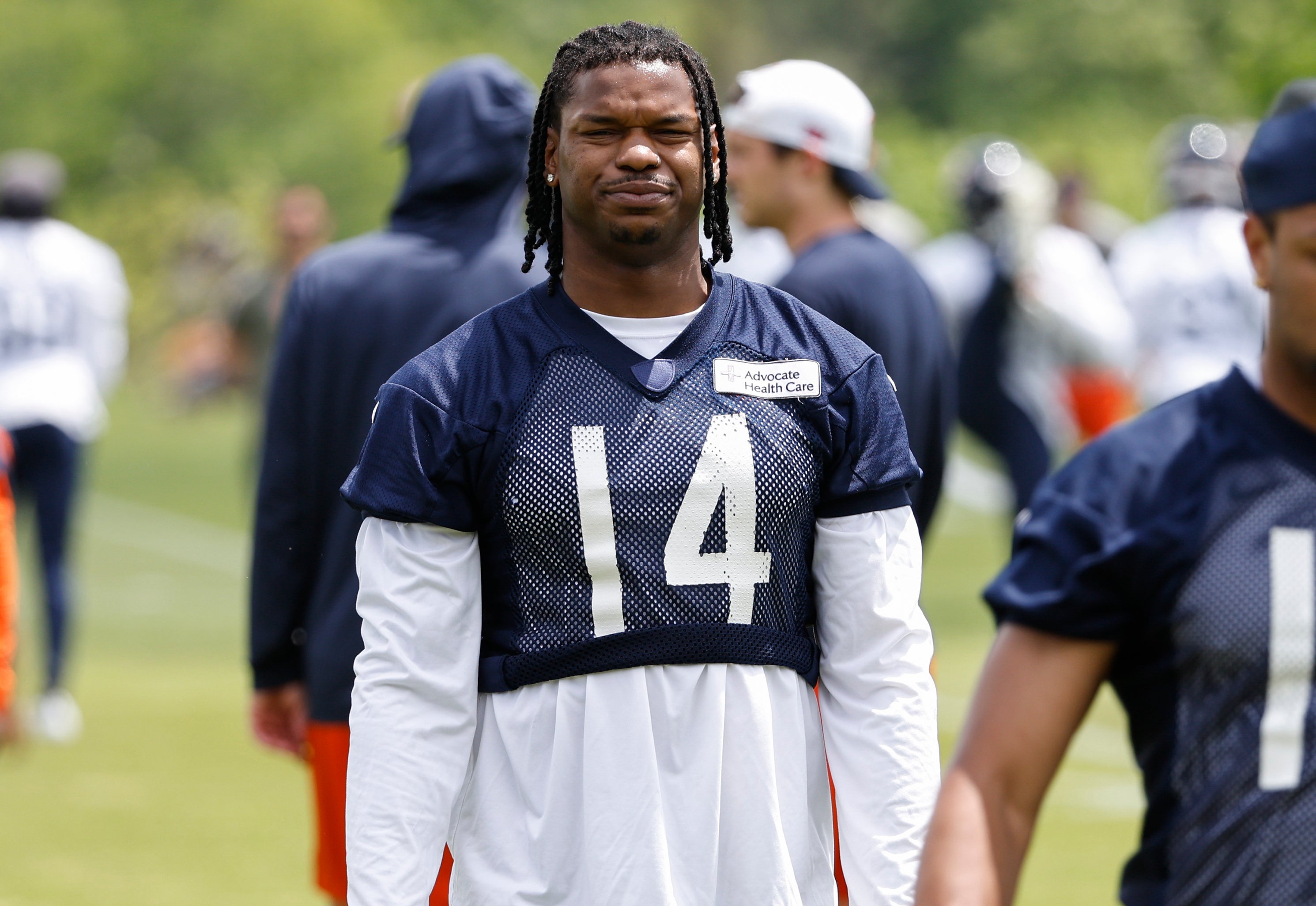 Jun 5, 2024; Lake Forest, IL, USA; Chicago Bears tight end Gerald Everett (14) looks on during the team's minicamp at Halas Hall.