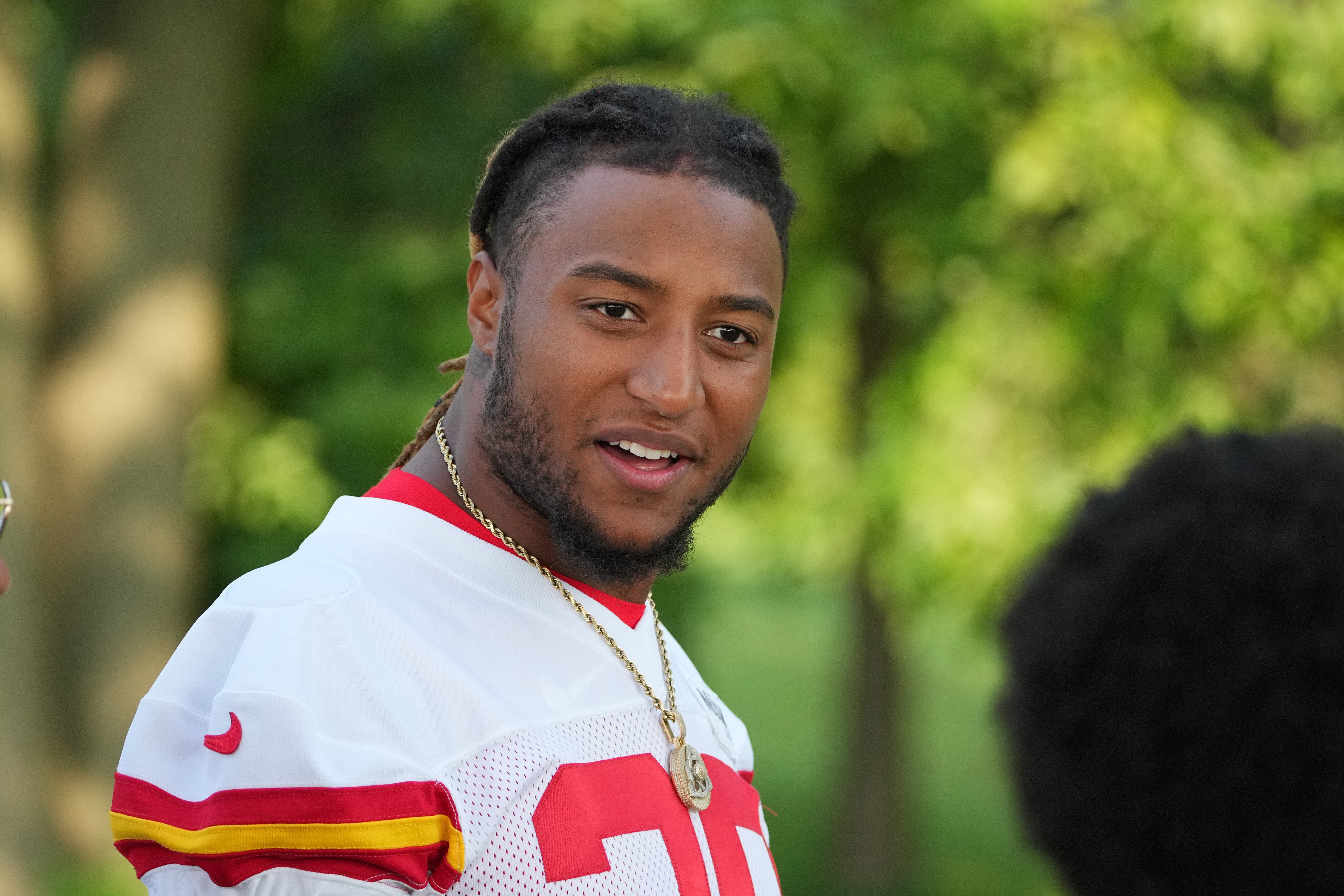 Jul 22, 2024; St. Joseph, MO, USA; Kansas City Chiefs safety Justin Reid (20) walks down the hill from the locker room to the fields prior to training camp at Missouri Western State University.