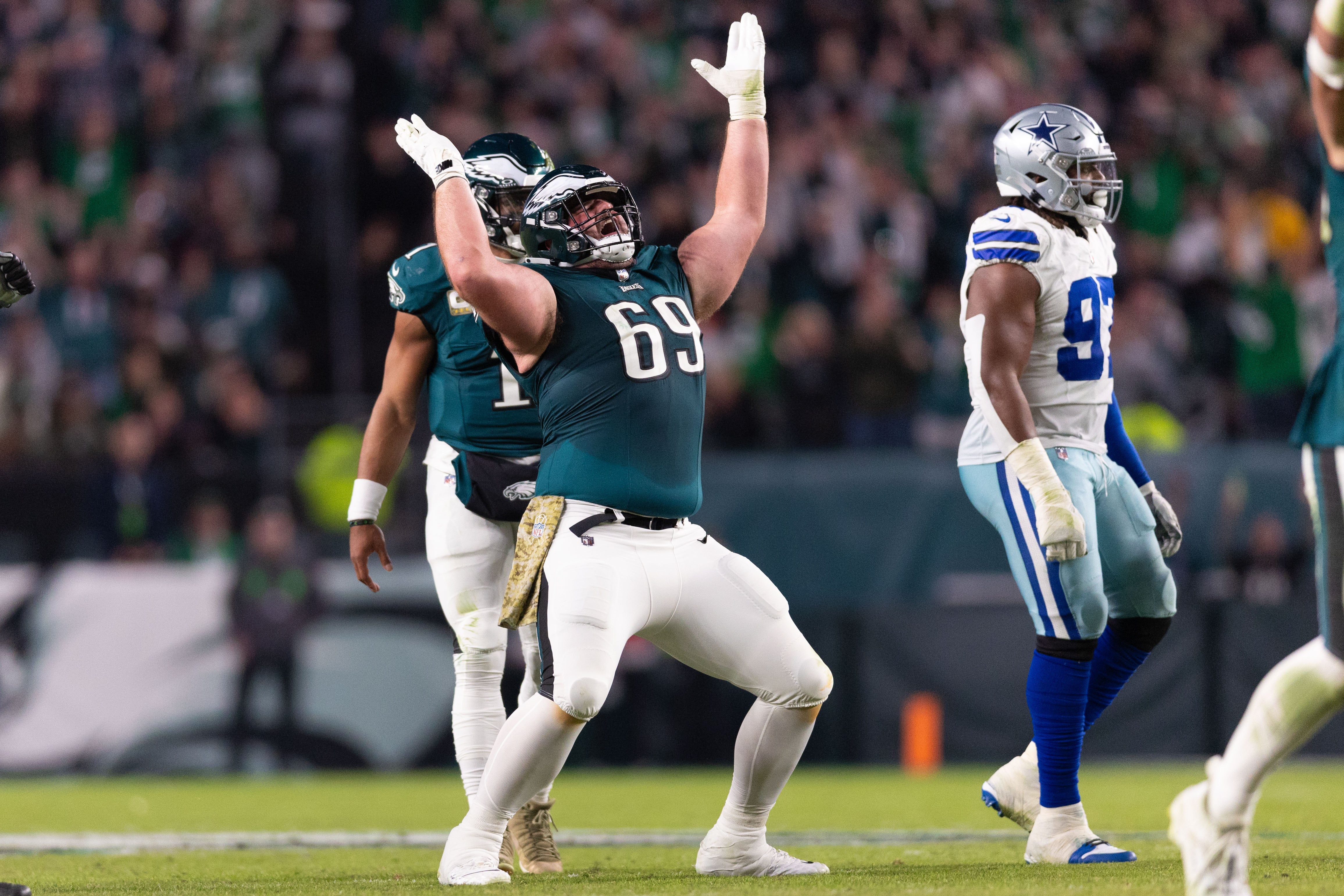 Philadelphia Eagles guard Landon Dickerson (69) reacts to a touchdown against the Dallas Cowboys during the third quarter at Lincoln Financial Field.