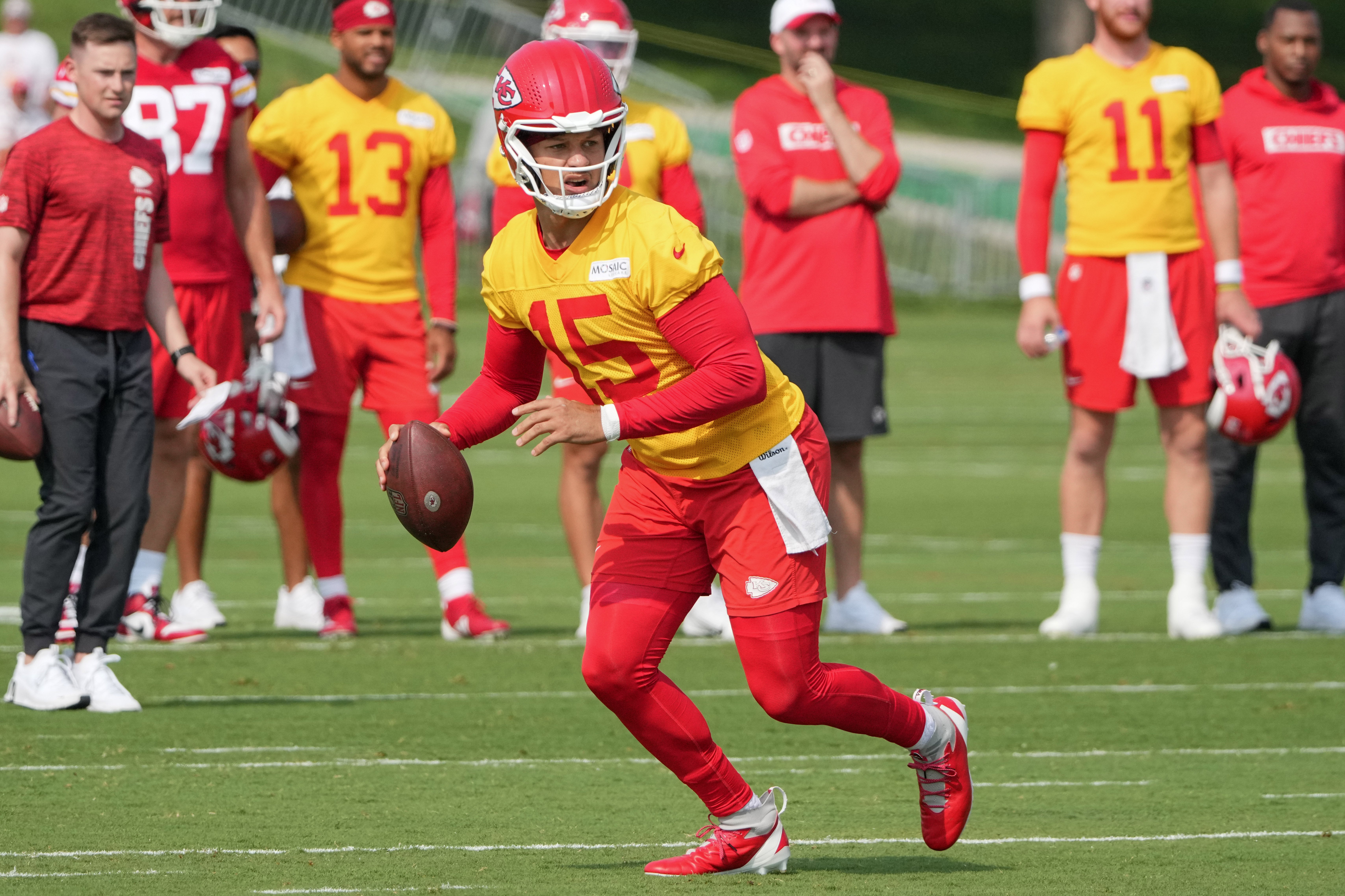 Jul 22, 2024; St. Joseph, MO, USA; Kansas City Chiefs quarterback Patrick Mahomes (15) drops back to pass during training camp at Missouri Western State University.