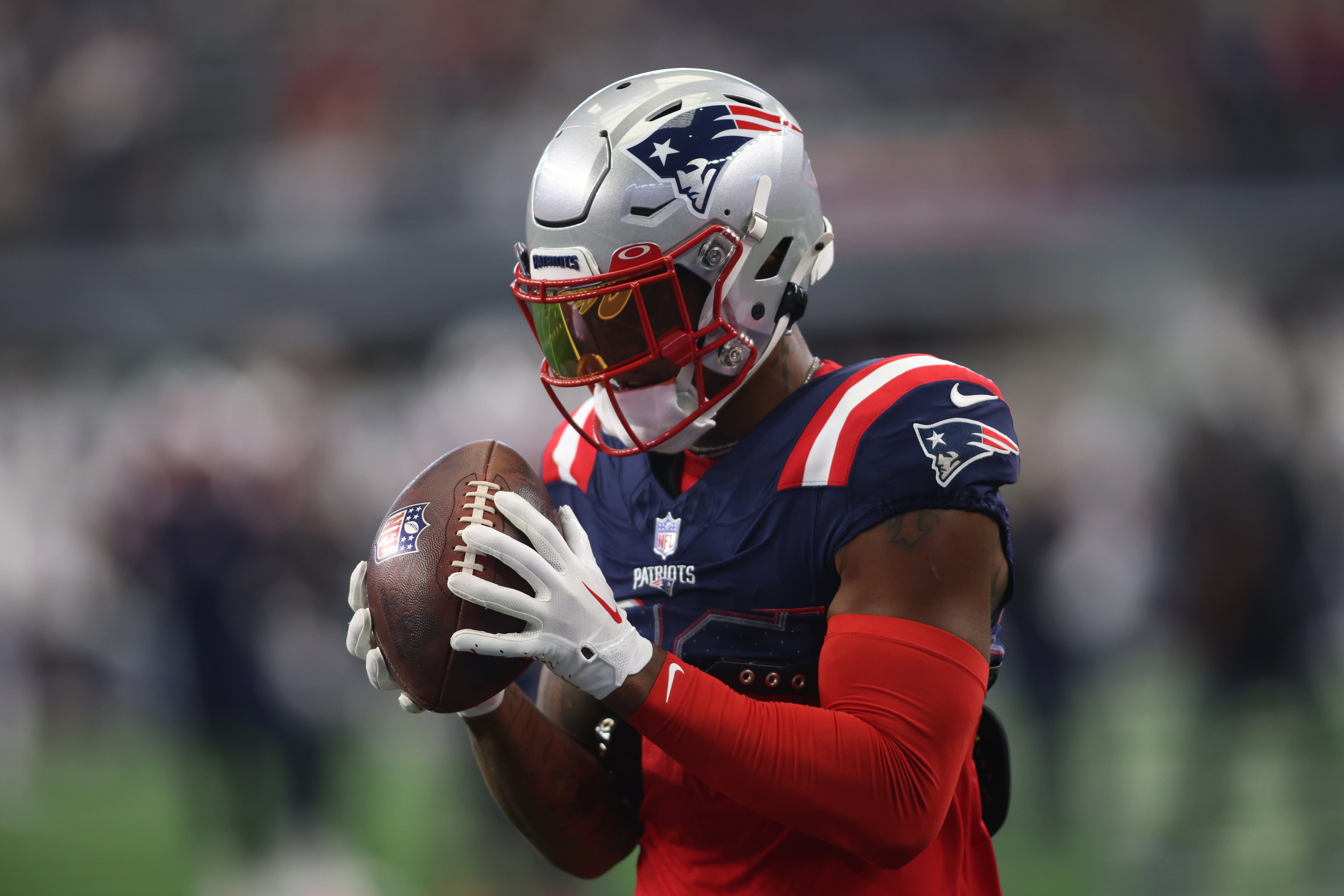 Oct 1, 2023; Arlington, Texas, USA; New England Patriots wide receiver Kendrick Bourne (84) catches a pass in warmups before the game against the Dallas Cowboys at AT&T Stadium.