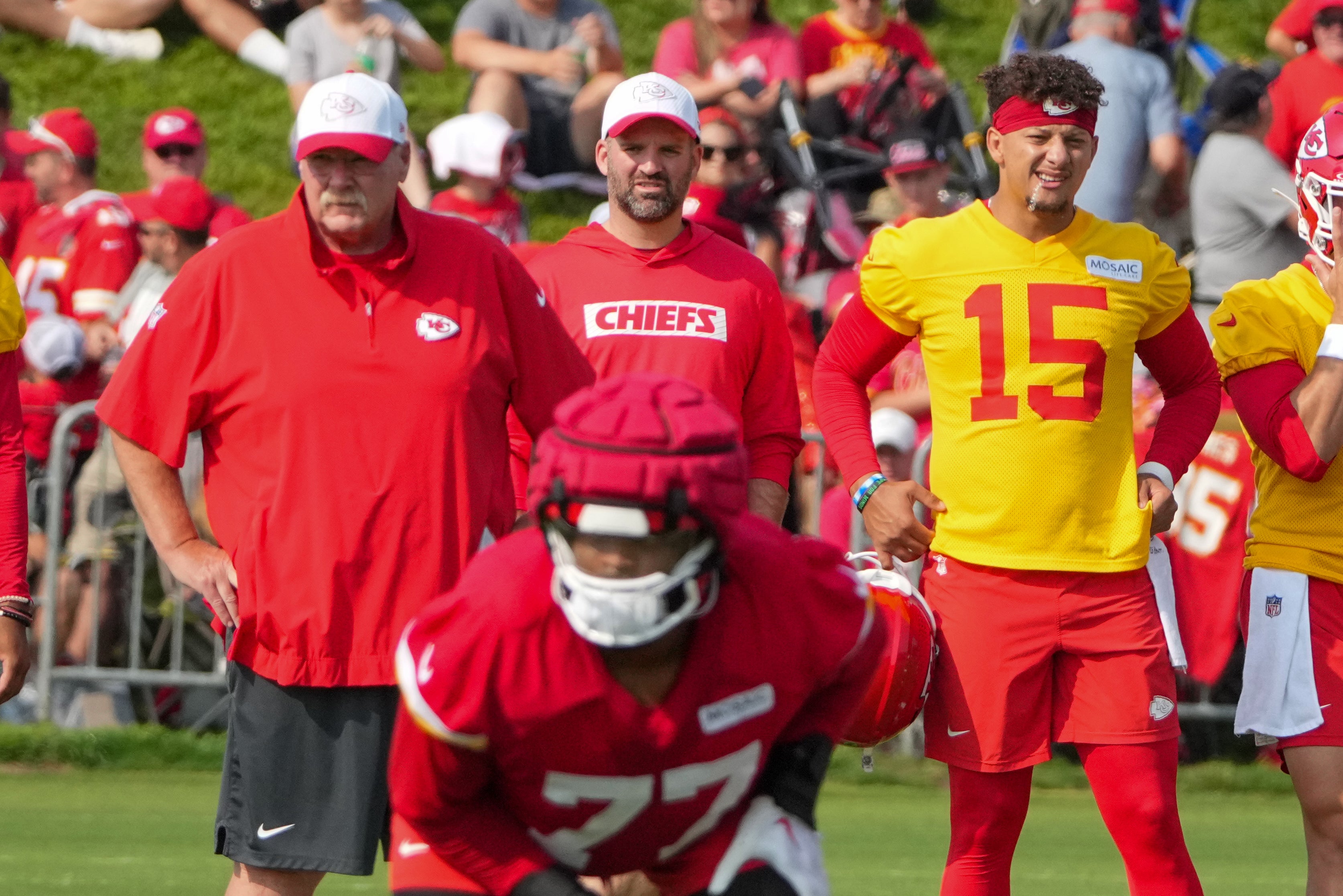 Jul 22, 2024; St. Joseph, MO, USA; Kansas City Chiefs head coach Andy Reid and quarterback Patrick Mahomes (15) look on during training camp at Missouri Western State University.