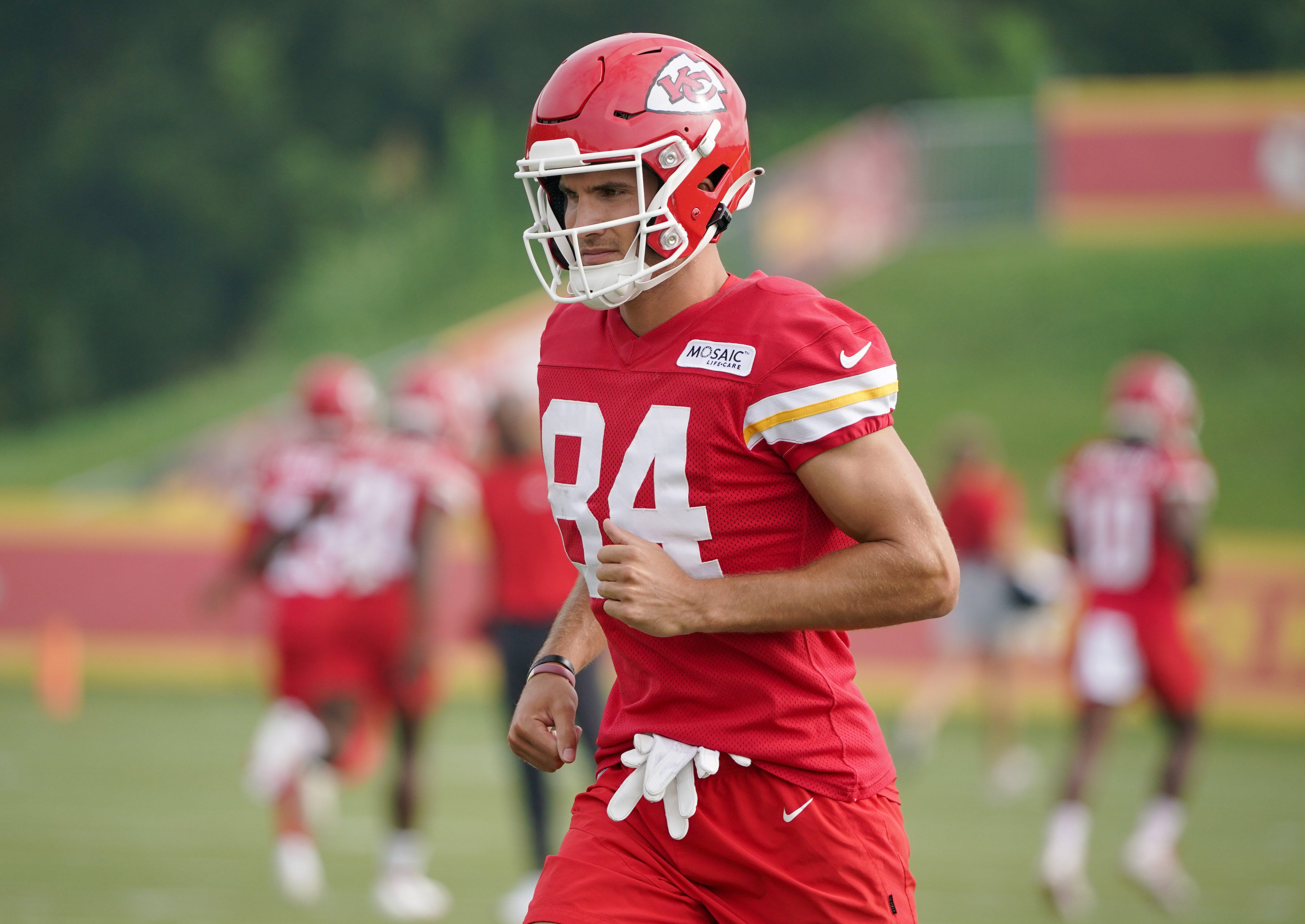 Jul 27, 2022; St. Joseph, MO, USA; Kansas City Chiefs wide receiver Justin Watson (84) runs drills during training camp at Missouri Western State University.