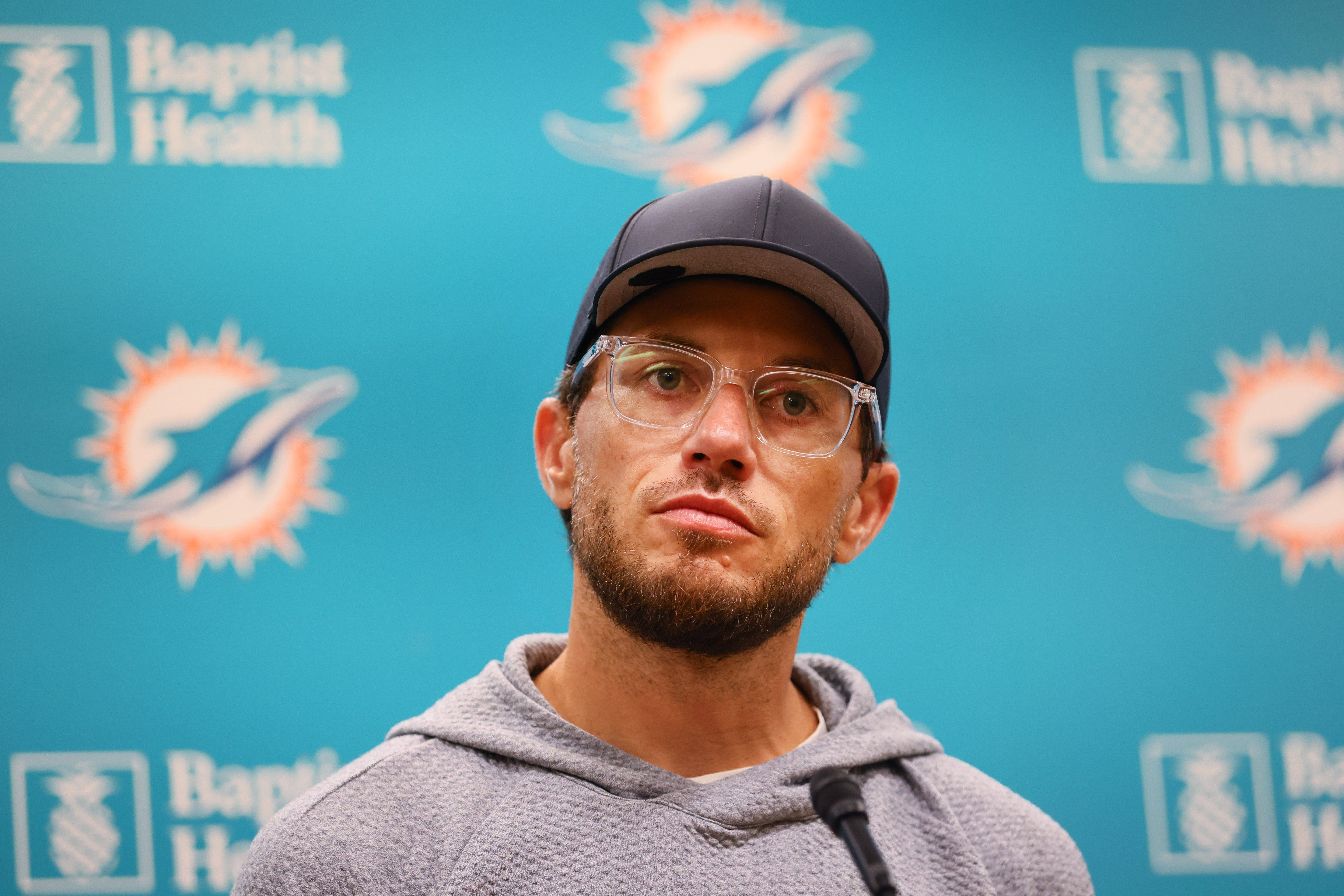 Jul 24, 2024; Miami Gardens, FL, USA; Miami Dolphins head coach Mike McDaniel talks to reporters during training camp at Baptist Health Training Complex.