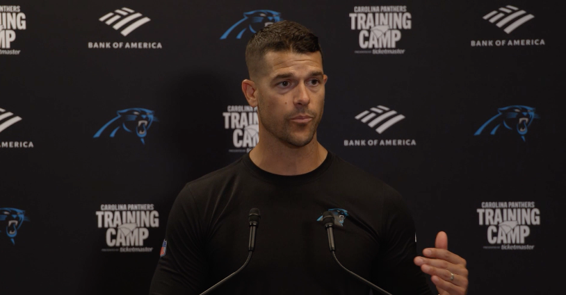 Panthers head coach Dave Canales talks to reporters after Thursday's training camp practice on July 25, 2024.