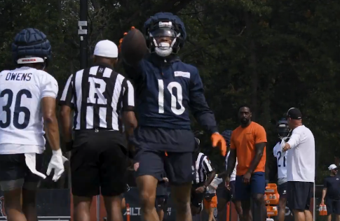 Tyler Scott celebrates after making a catch during training camp.