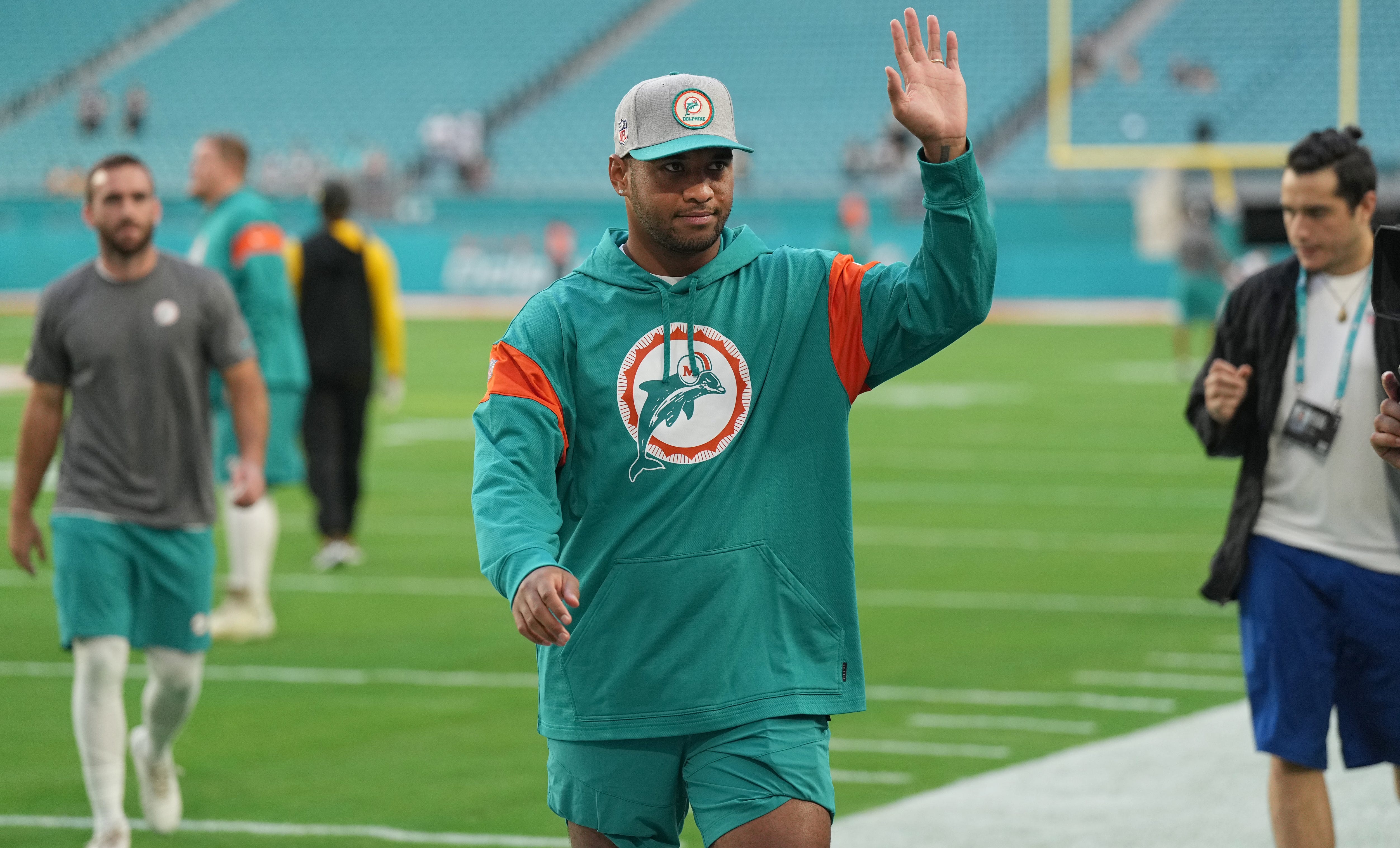 Miami Dolphins quarterback Tua Tagovailoa (1) waives to fans before the start of the game against the Pittsburgh Steelers at Hard Rock Stadium in Miami Gardens, Oct. 23, 2022.